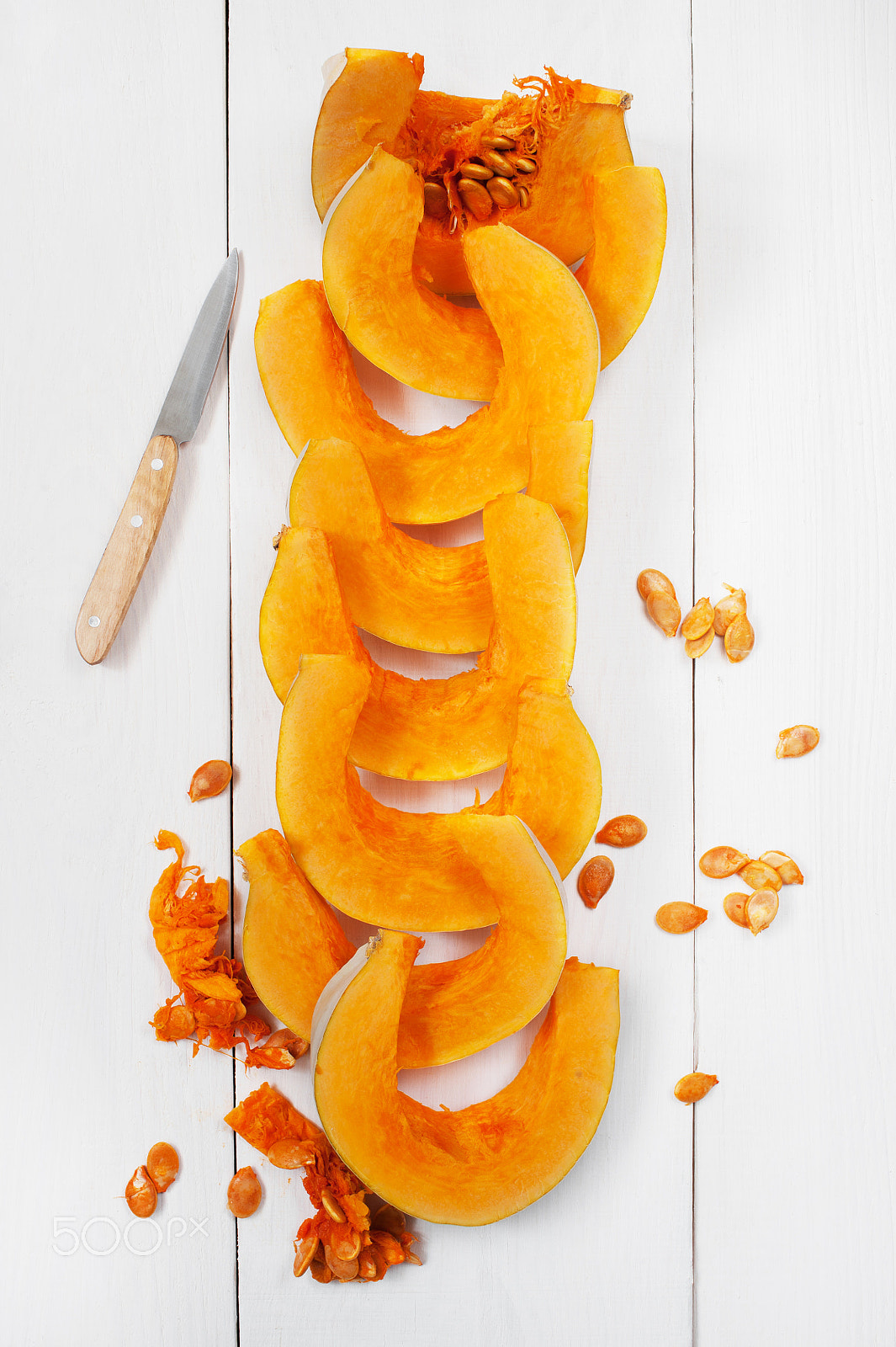 Sigma 50mm F1.4 EX DG HSM sample photo. Fresh sliced pumpkin on the white wooden table photography