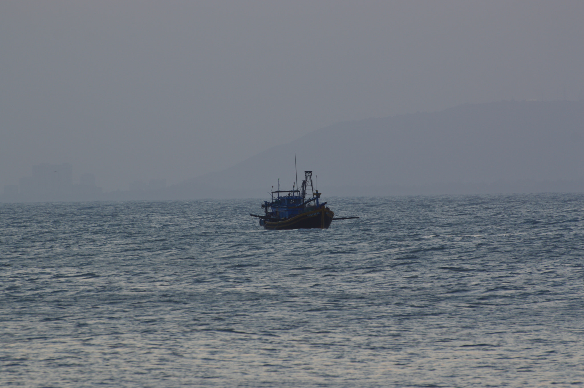 Nikon D3200 sample photo. Solo fishing boat2 photography