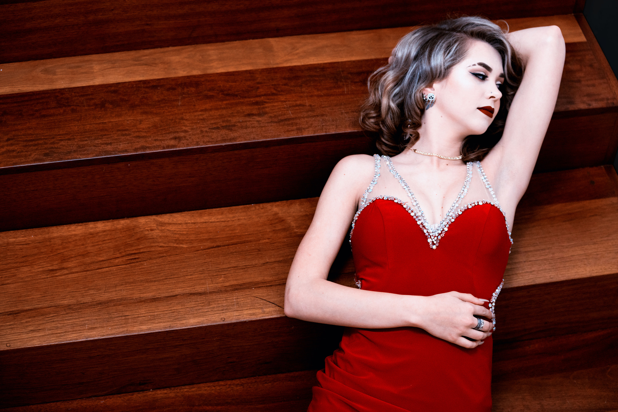 Sony a99 II sample photo. Red dress on stairs photography