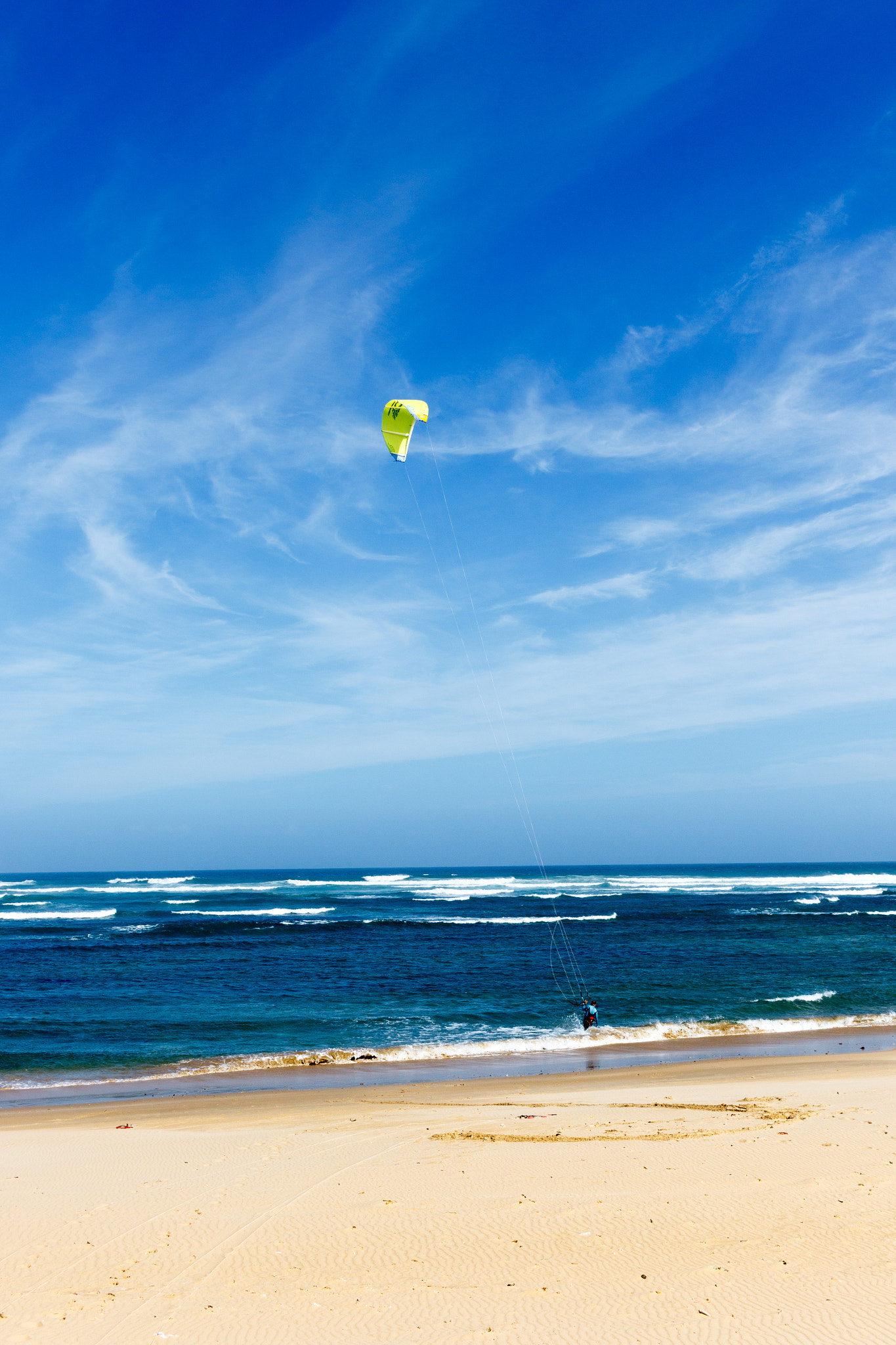 Canon EF-S 24mm F2.8 STM sample photo. Kitesurfing at the beach photography