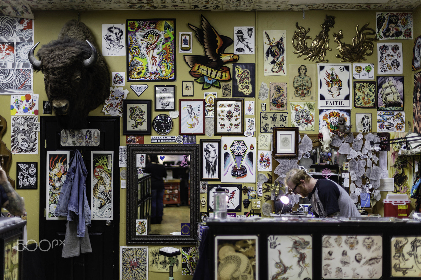 Canon EOS 5DS R + Canon EF 50mm F1.4 USM sample photo. Artwork inside a tattoo shop photography