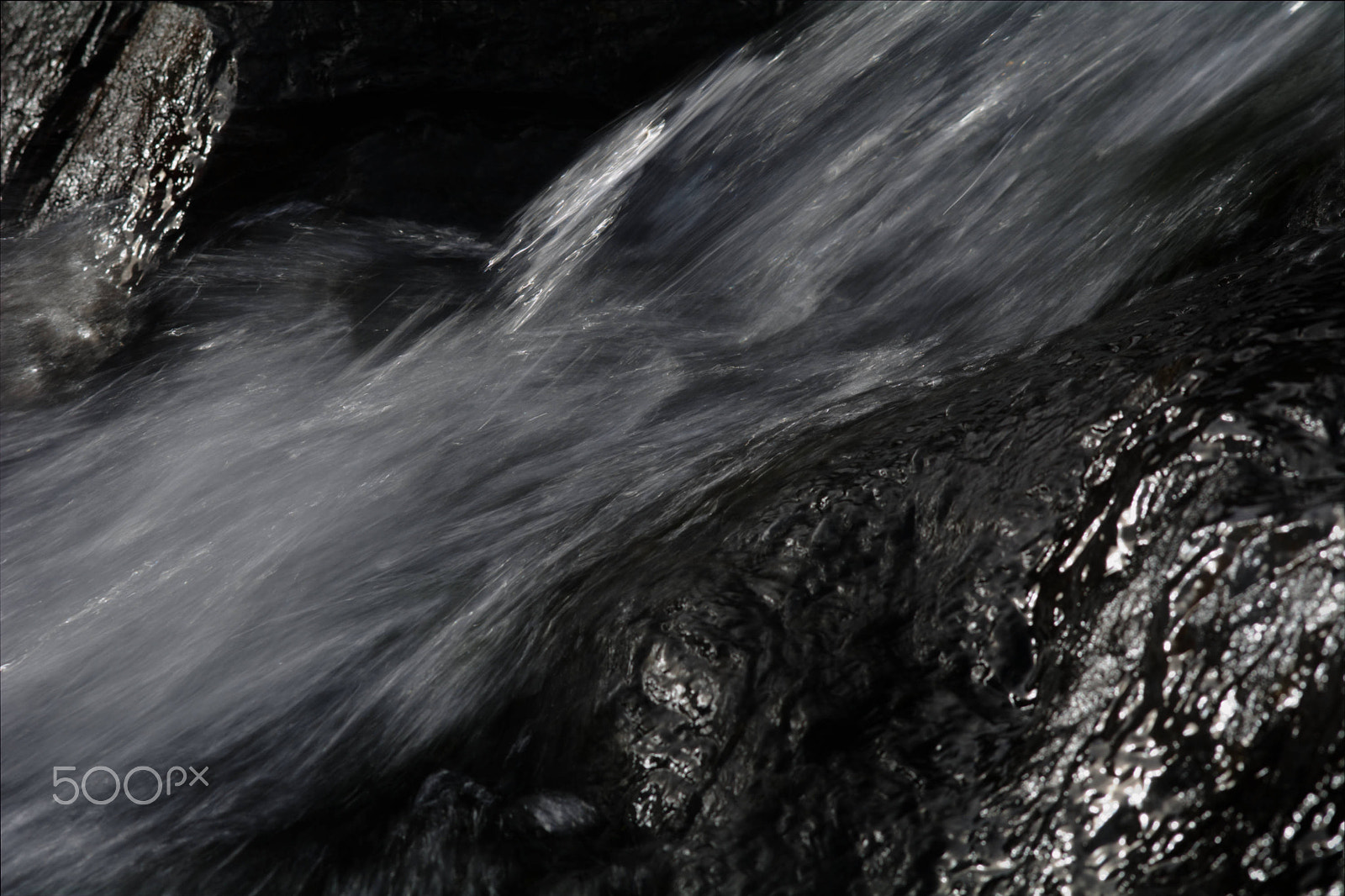 Nikon D7100 + Nikon AF-Nikkor 80-200mm F2.8D ED sample photo. Timed exposure of a stream in full flow photography