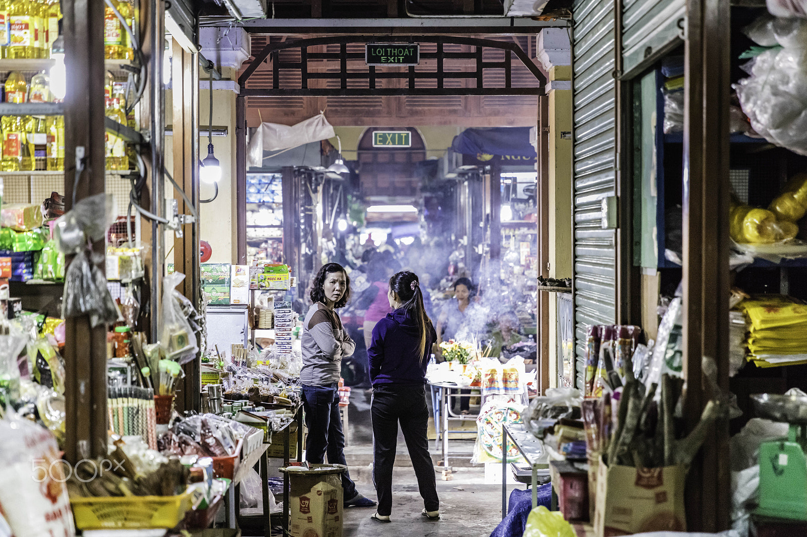Canon EF 24-70mm F2.8L II USM sample photo. Two women in a market photography