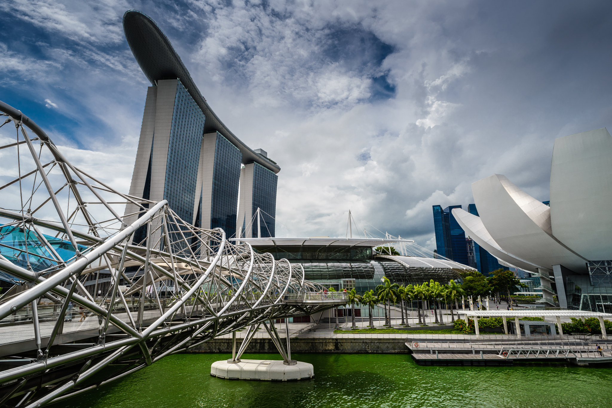 Nikon D600 + Nikon AF Nikkor 20mm F2.8D sample photo. Walking toward marina bay sands hotel photography