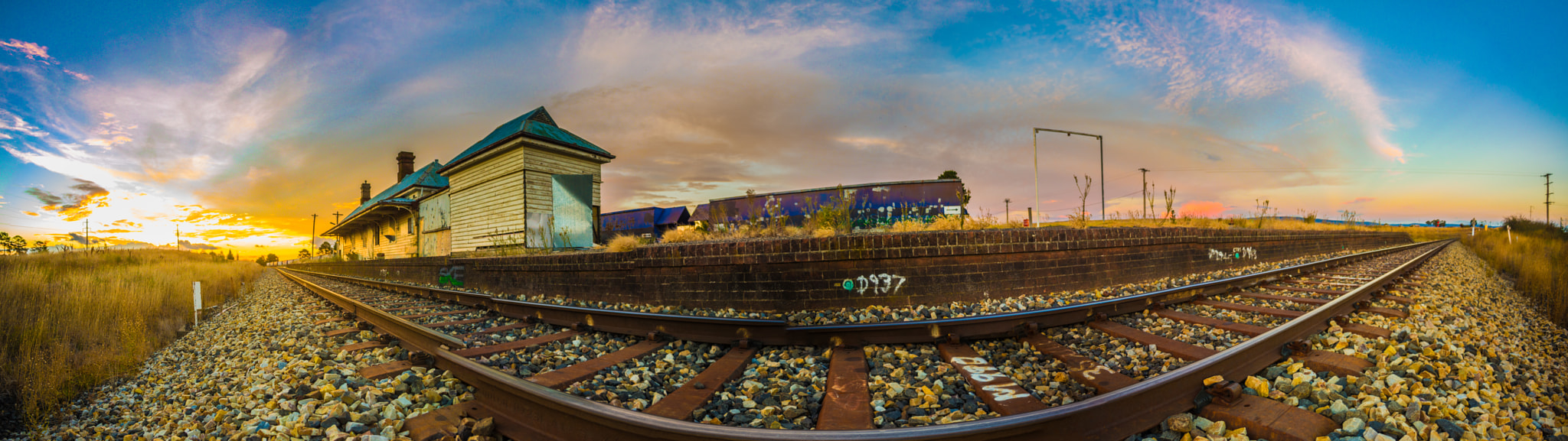 Tamron AF 19-35mm f/3.5-4.5 (A10) sample photo. Train tracks photography