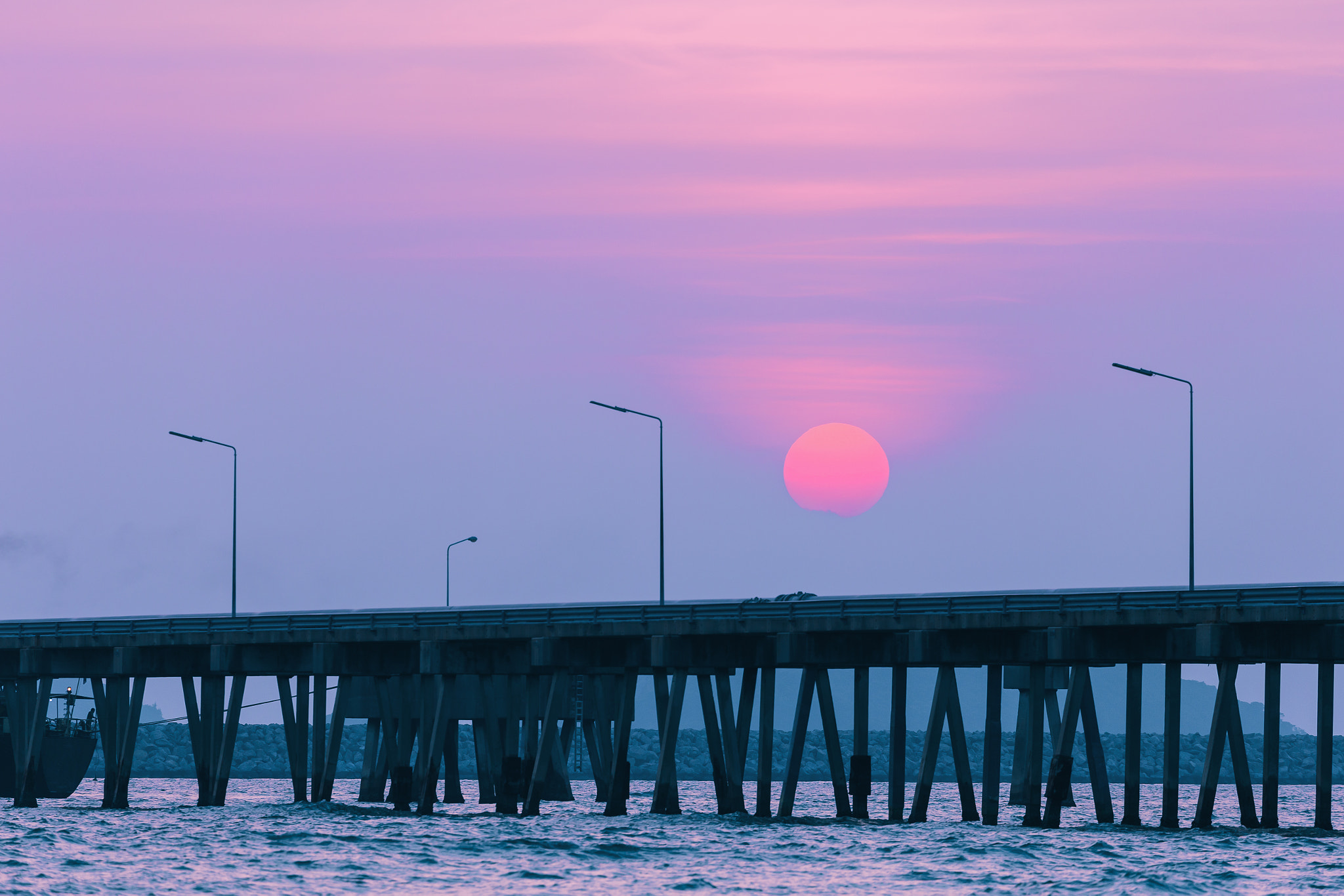Canon EF 70-300mm F4-5.6L IS USM sample photo. Silhouette bridge with sunset sky photography