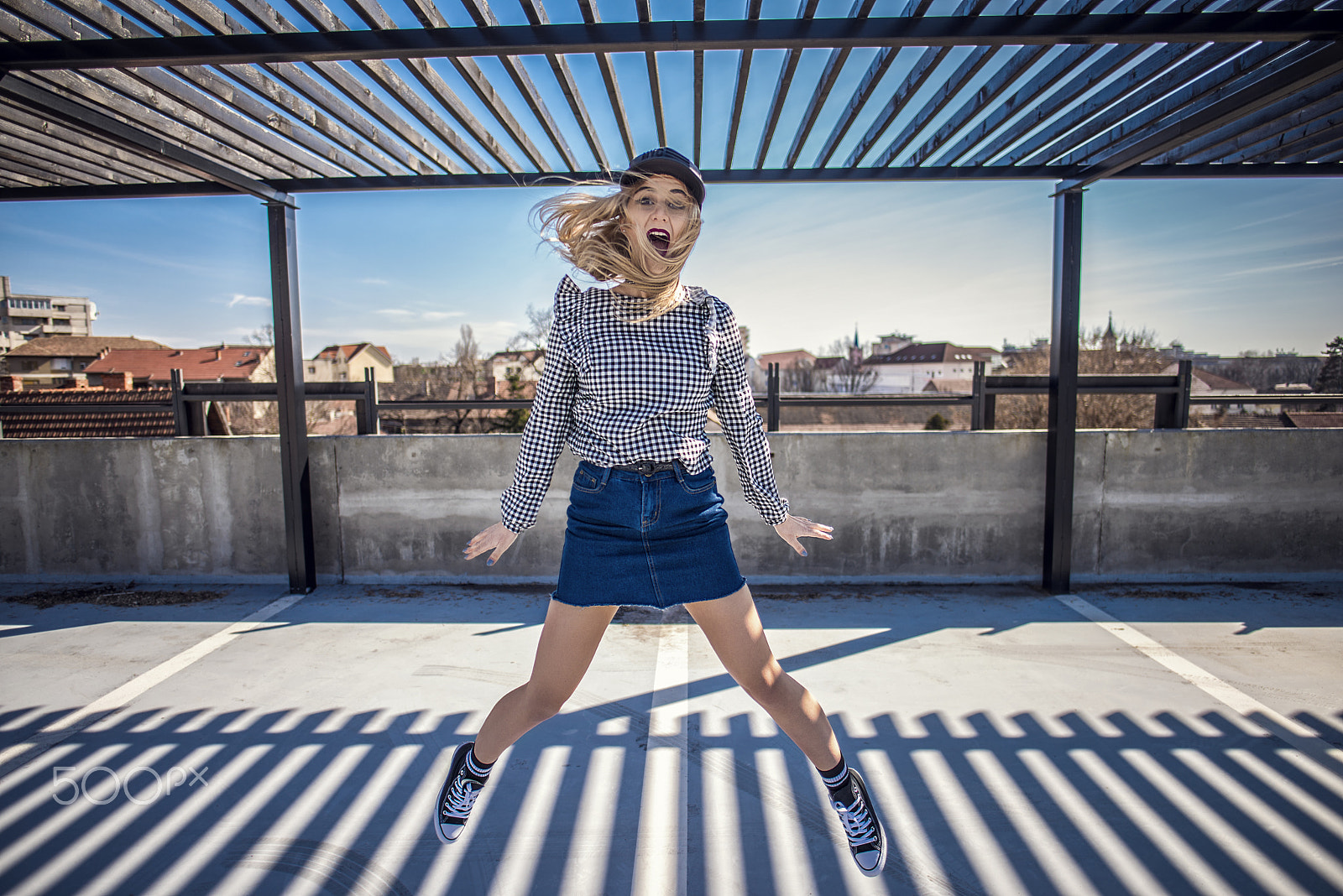 Nikon D600 sample photo. Happy woman jumping in her classic sneakers photography