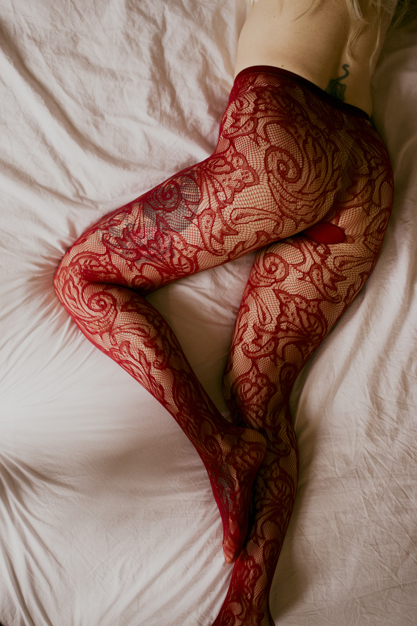 Nikon D3100 + Sigma 35mm F1.4 DG HSM Art sample photo. Red tights photography