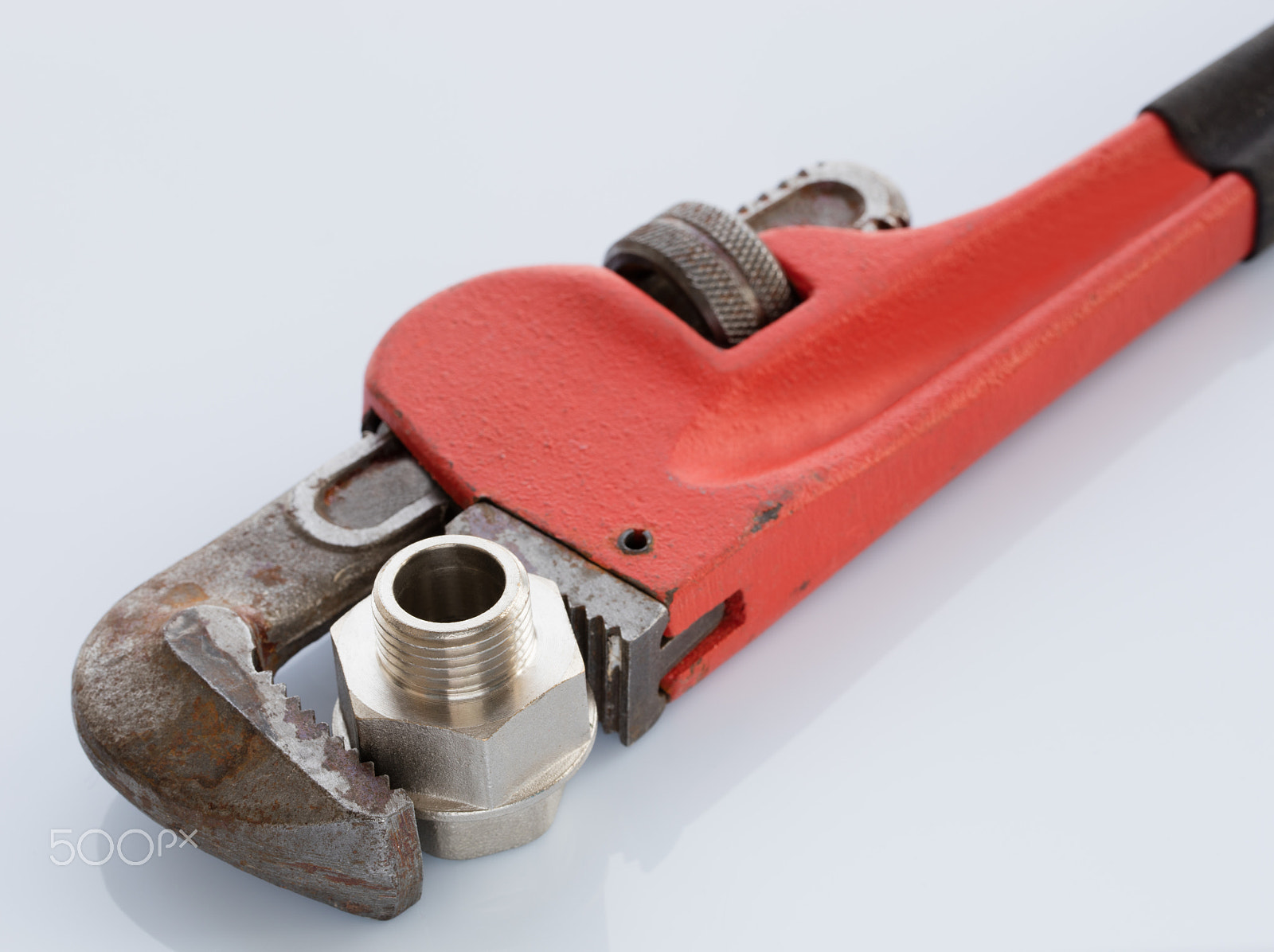 Canon EF 100mm F2.8L Macro IS USM sample photo. Adjustable wrench on light gray background photography