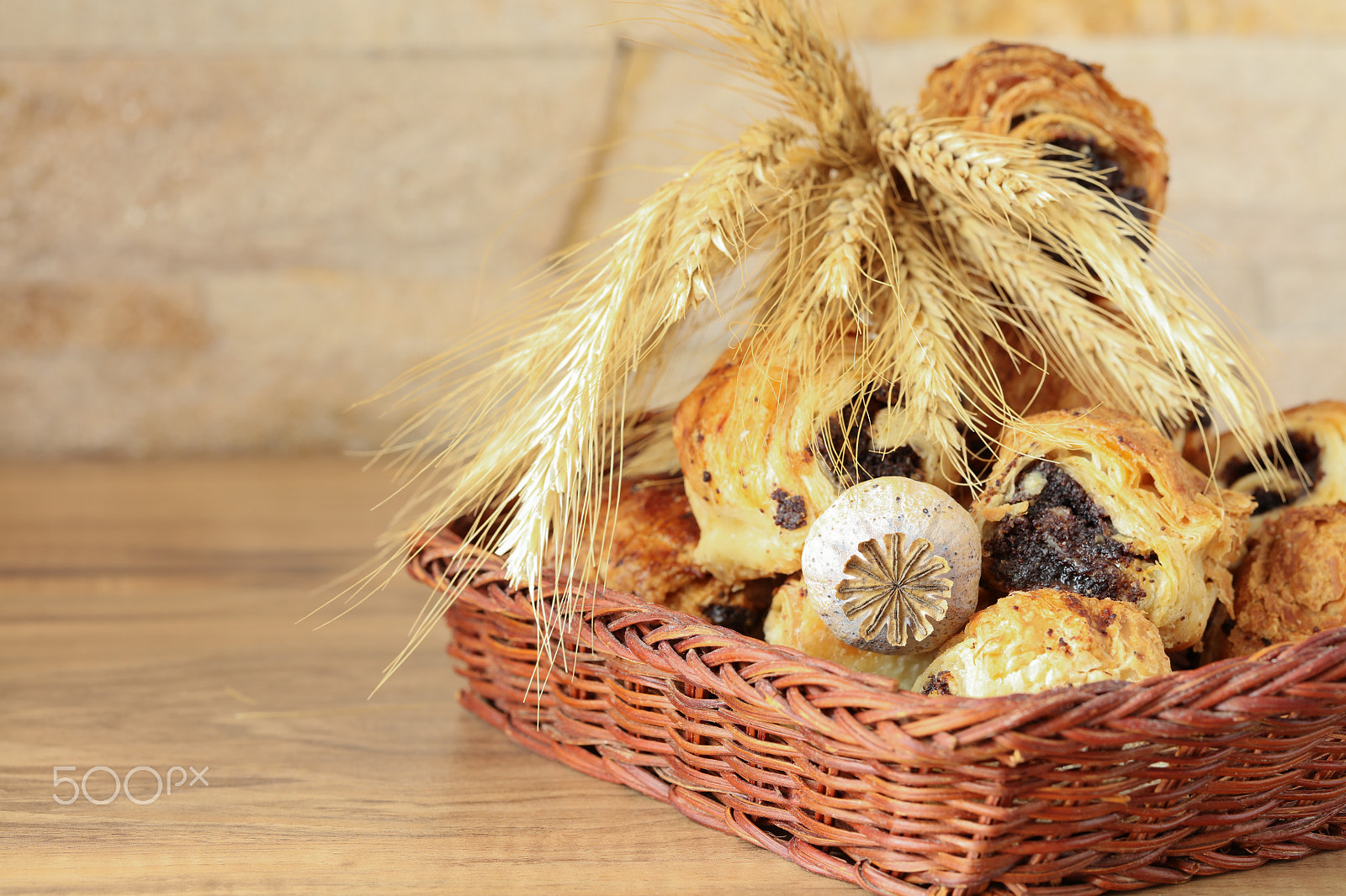 Canon EF 100mm F2.8L Macro IS USM sample photo. Sweet rolls with poppy seeds lie in a wicker basket photography