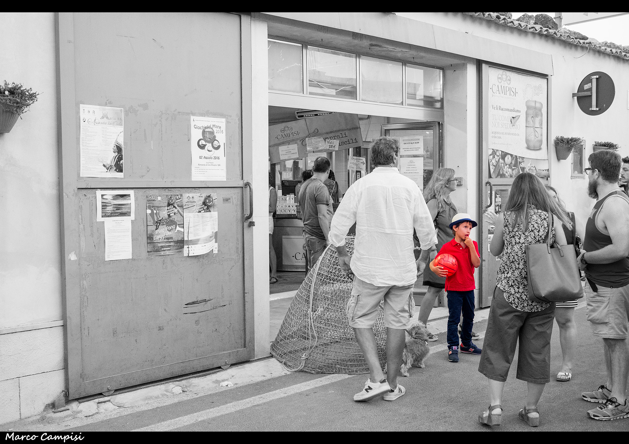 Fujifilm XF 27mm F2.8 sample photo. Redboy in fish market photography