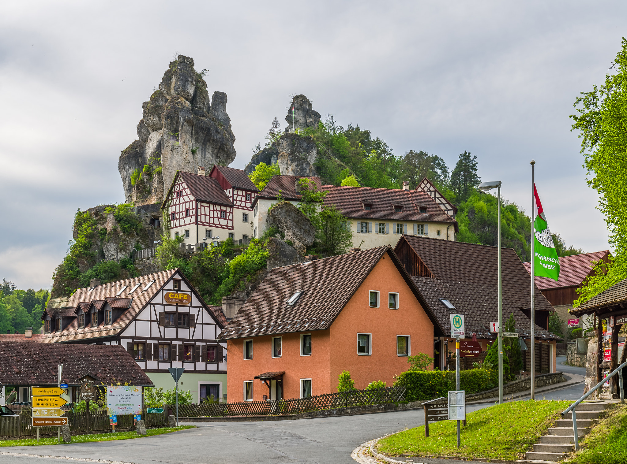 Leica SL (Typ 601) sample photo. Small village and a towering rock photography