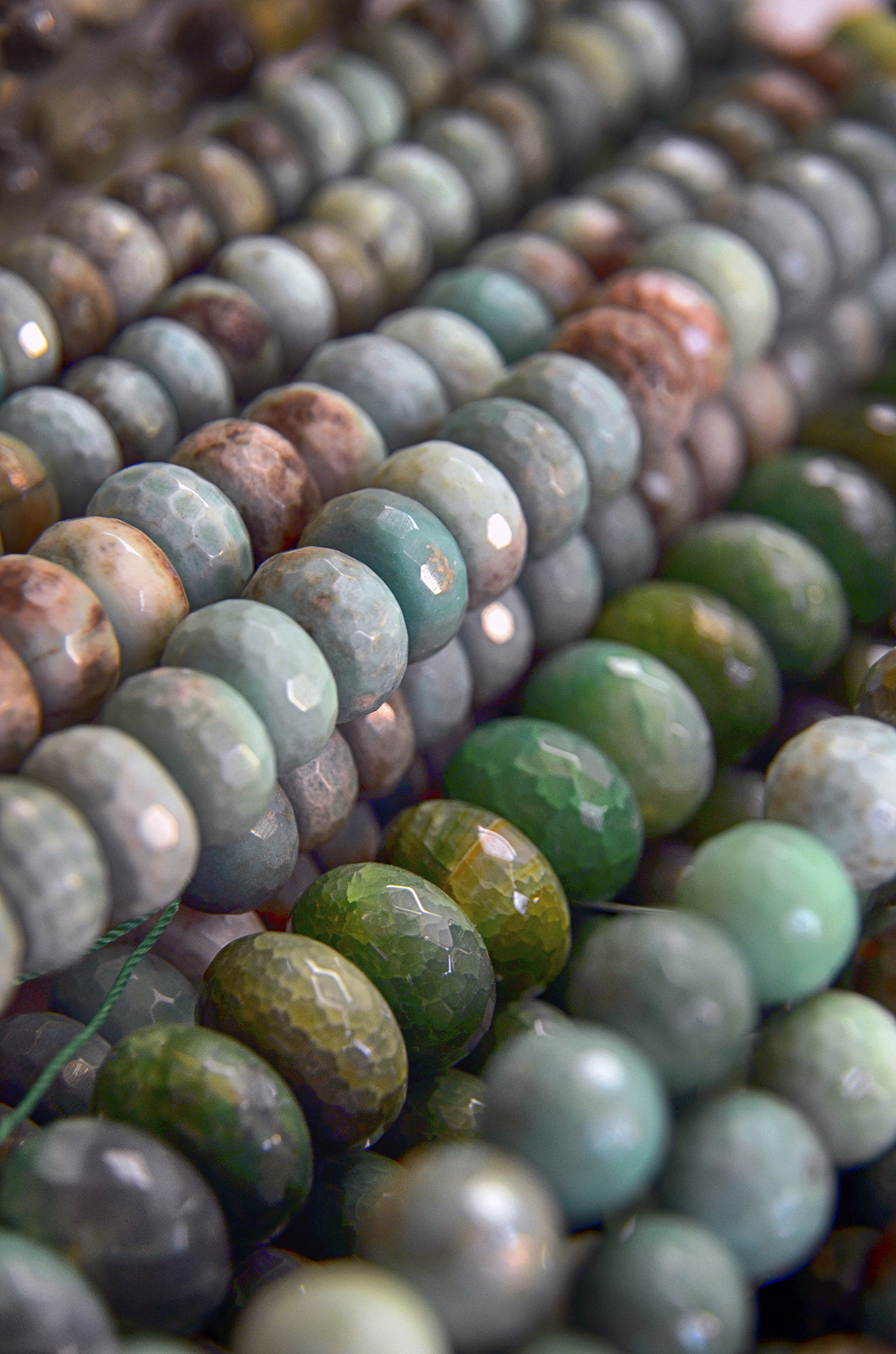 Nikon D5100 sample photo. Lines of colored beads at a gem fair photography