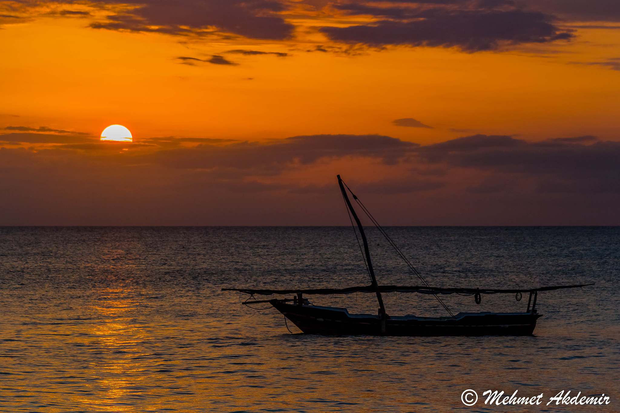 Canon EOS 100D (EOS Rebel SL1 / EOS Kiss X7) + Canon EF 70-200mm F4L IS USM sample photo. Sunset İn zanzibar photography
