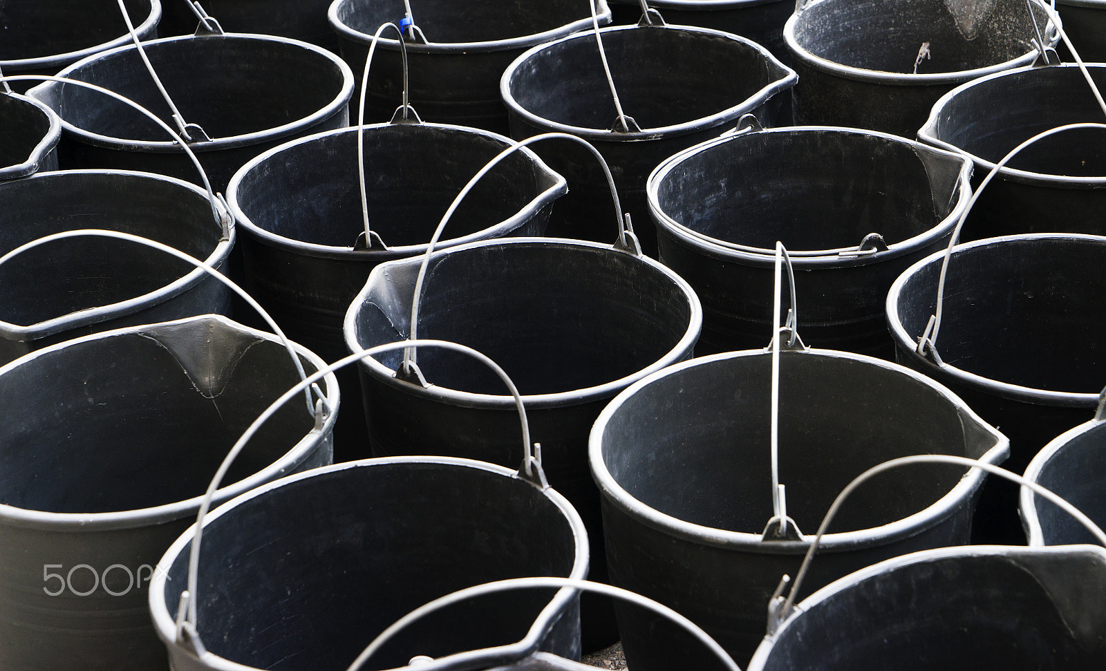 Sony a7 + Sony Vario Tessar T* FE 24-70mm F4 ZA OSS sample photo. The black buckets pails photography