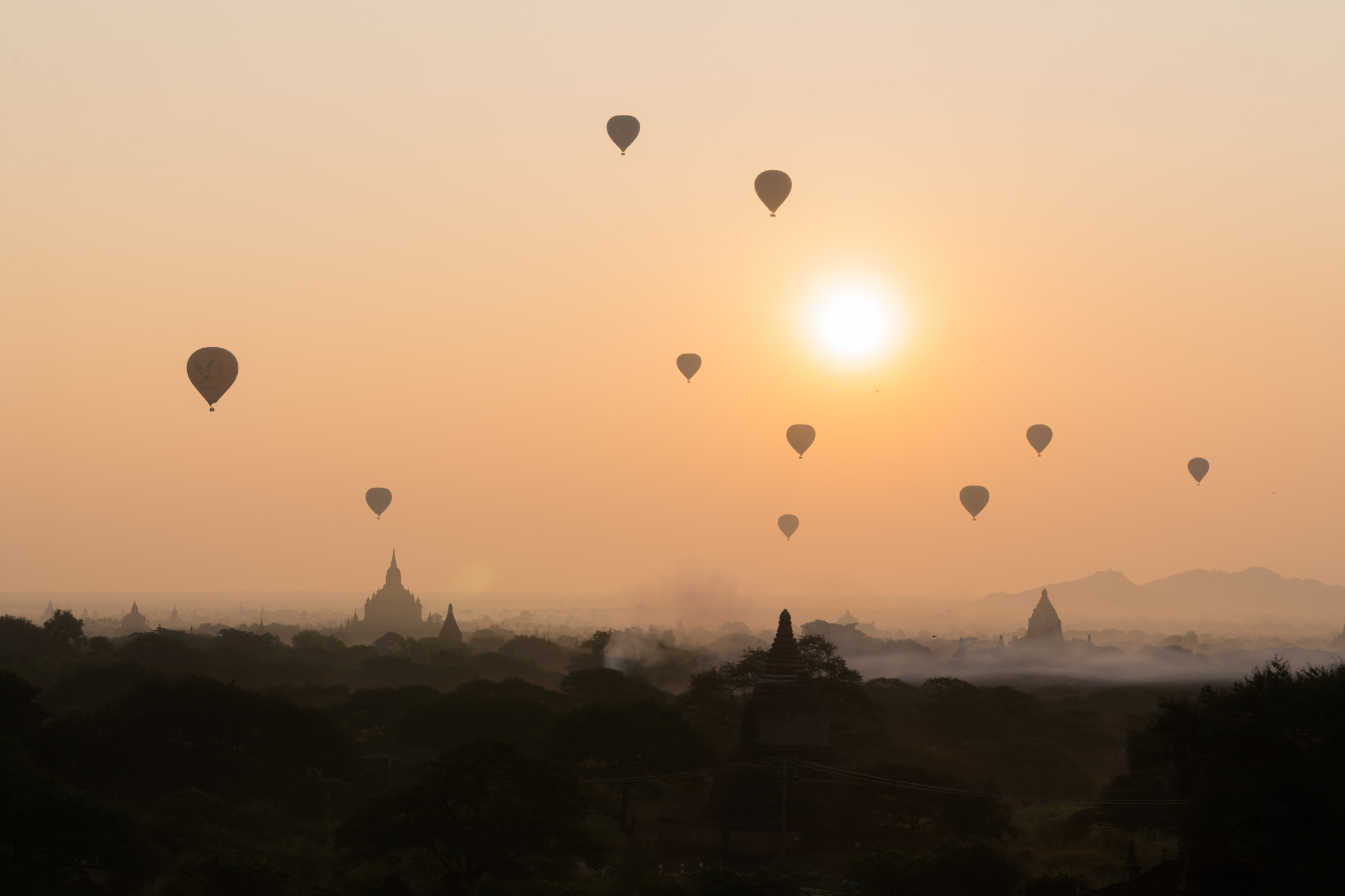 Sony a7R II sample photo. Bagan pagoda field with hot air balloons photography