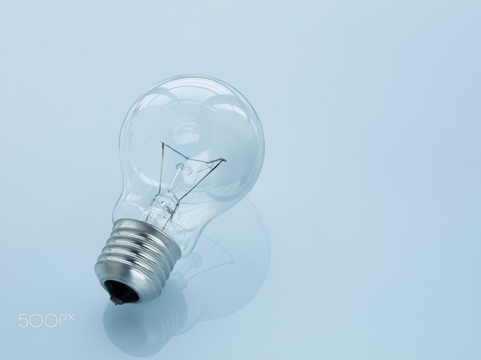 Canon EF 100mm F2.8L Macro IS USM sample photo. Light bulb on light blue background. photography