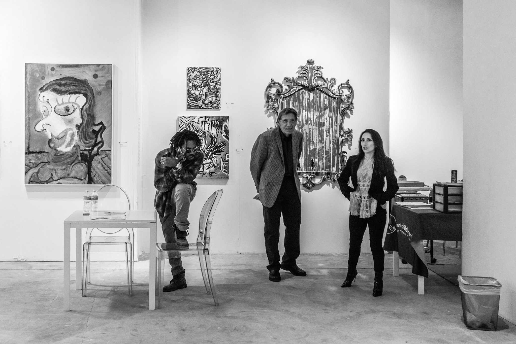 35mm F2.0 sample photo. People of miami - of art....and phones... photography