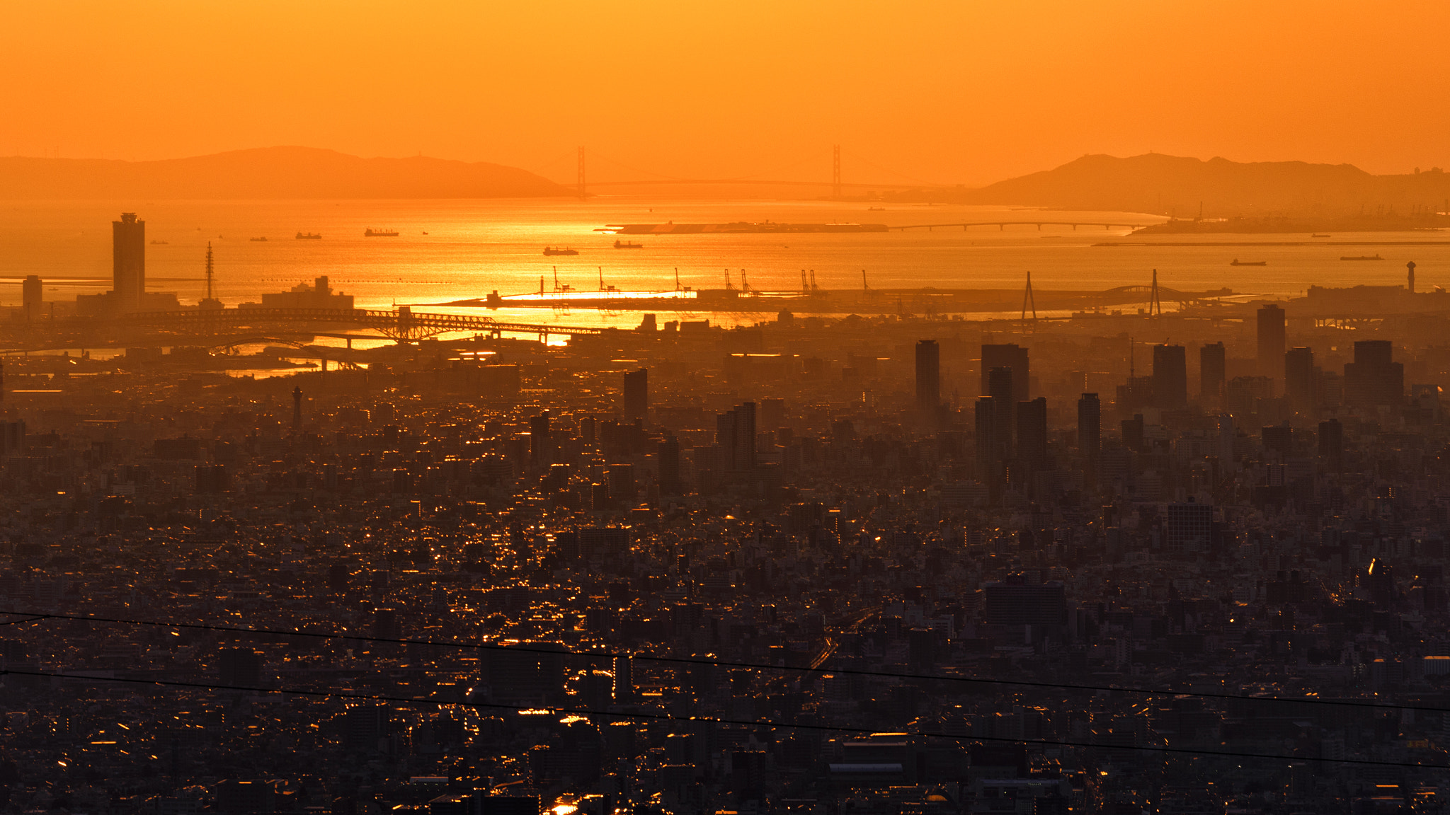 Nikon D610 + Nikon AF-S Nikkor 70-200mm F4G ED VR sample photo. Crimson city at sunset, osaka japan photography