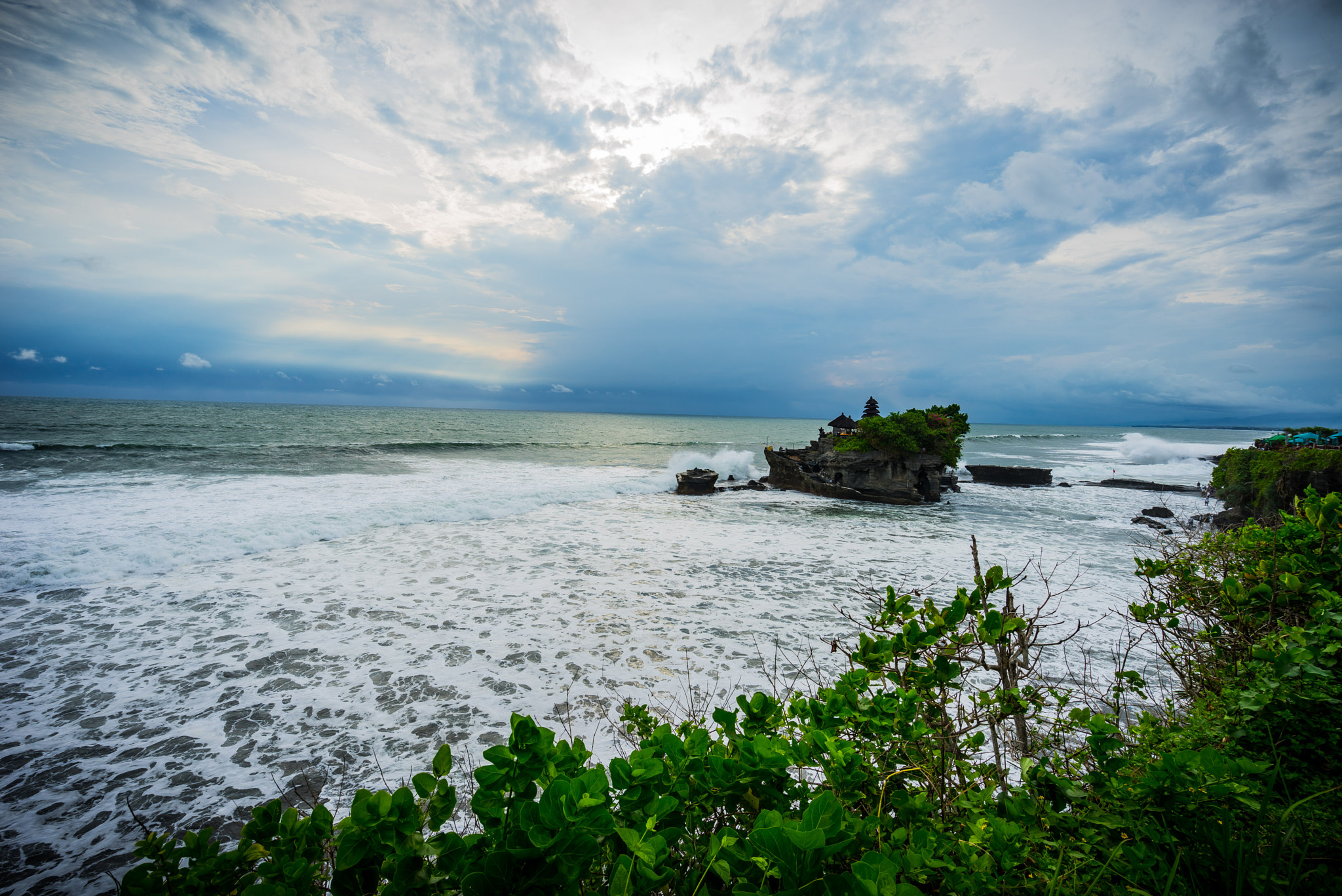 Sony a7R sample photo. Tanah lot with high tide and lots of water photography