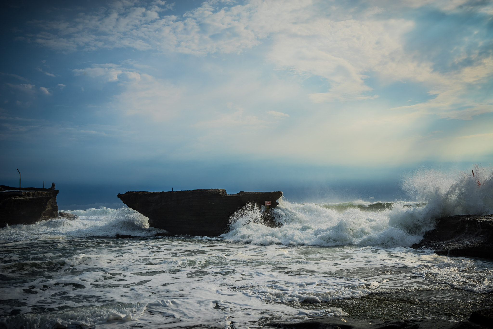 Sony a7R sample photo. Tanah lot with high tide and lots of water photography