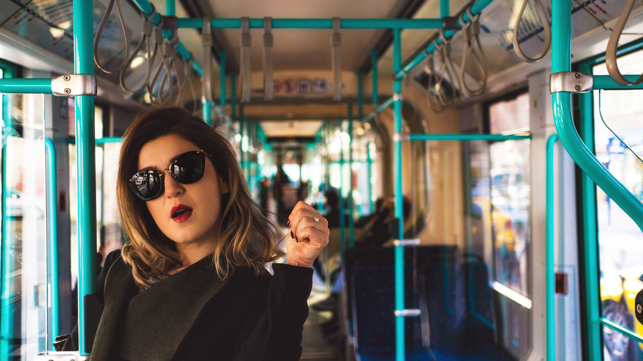 Sony a6300 + Sony Sonnar T* E 24mm F1.8 ZA sample photo. Girl on a tram photography