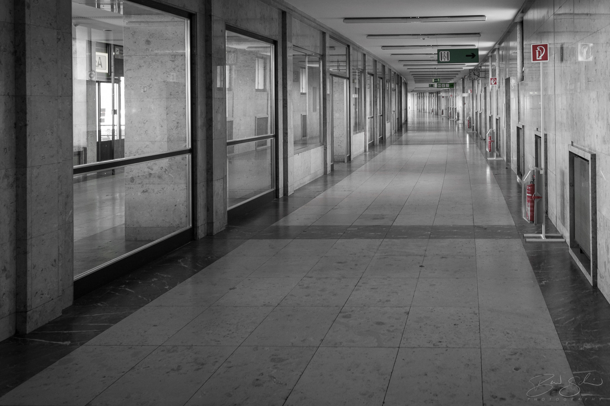 Canon EOS 7D Mark II + Canon EF 300mm f/2.8L sample photo. Airport tempelhof corridor photography