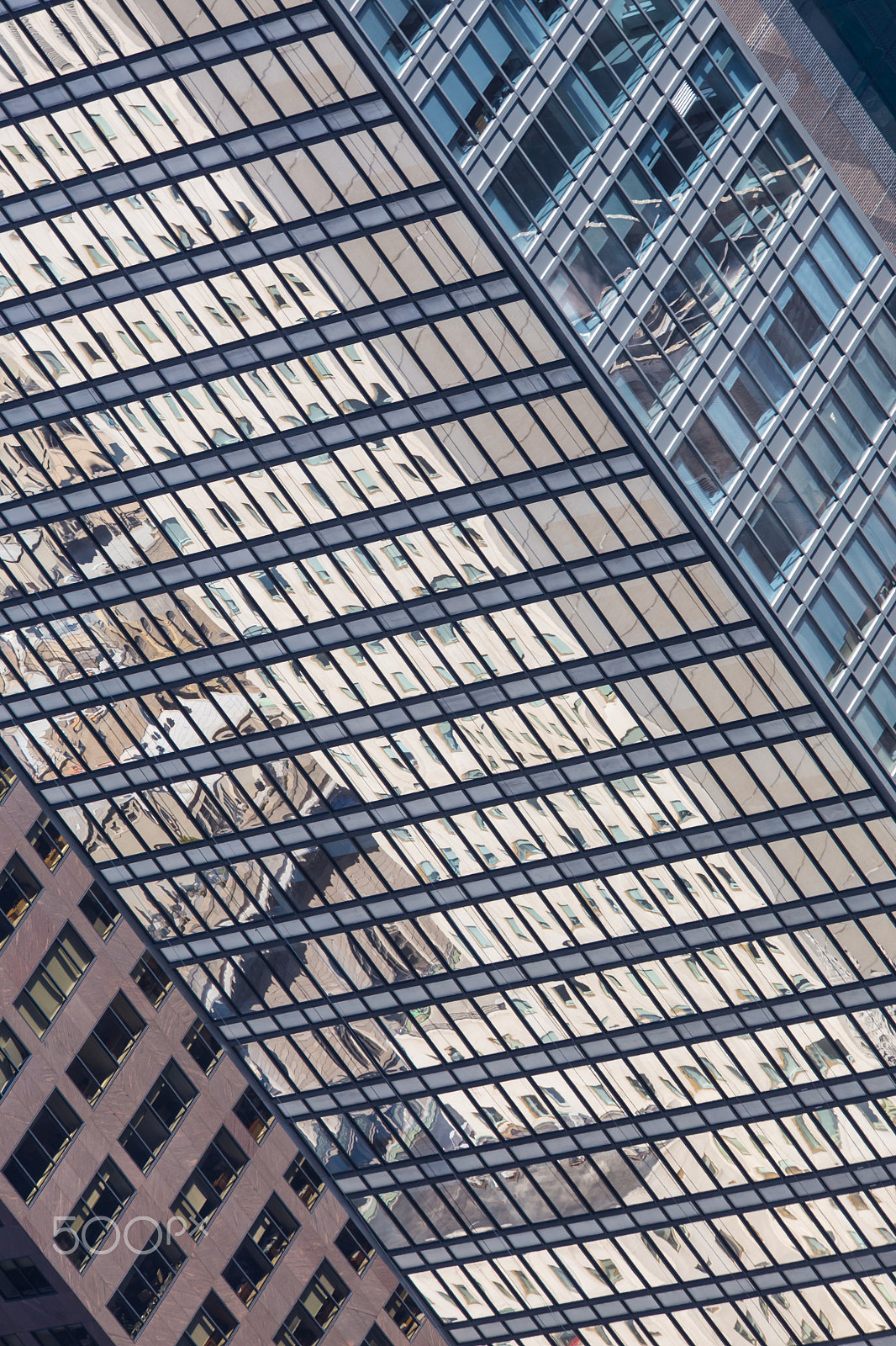 Canon EF 70-200mm F4L IS USM sample photo. Windows of a modern office building. photography