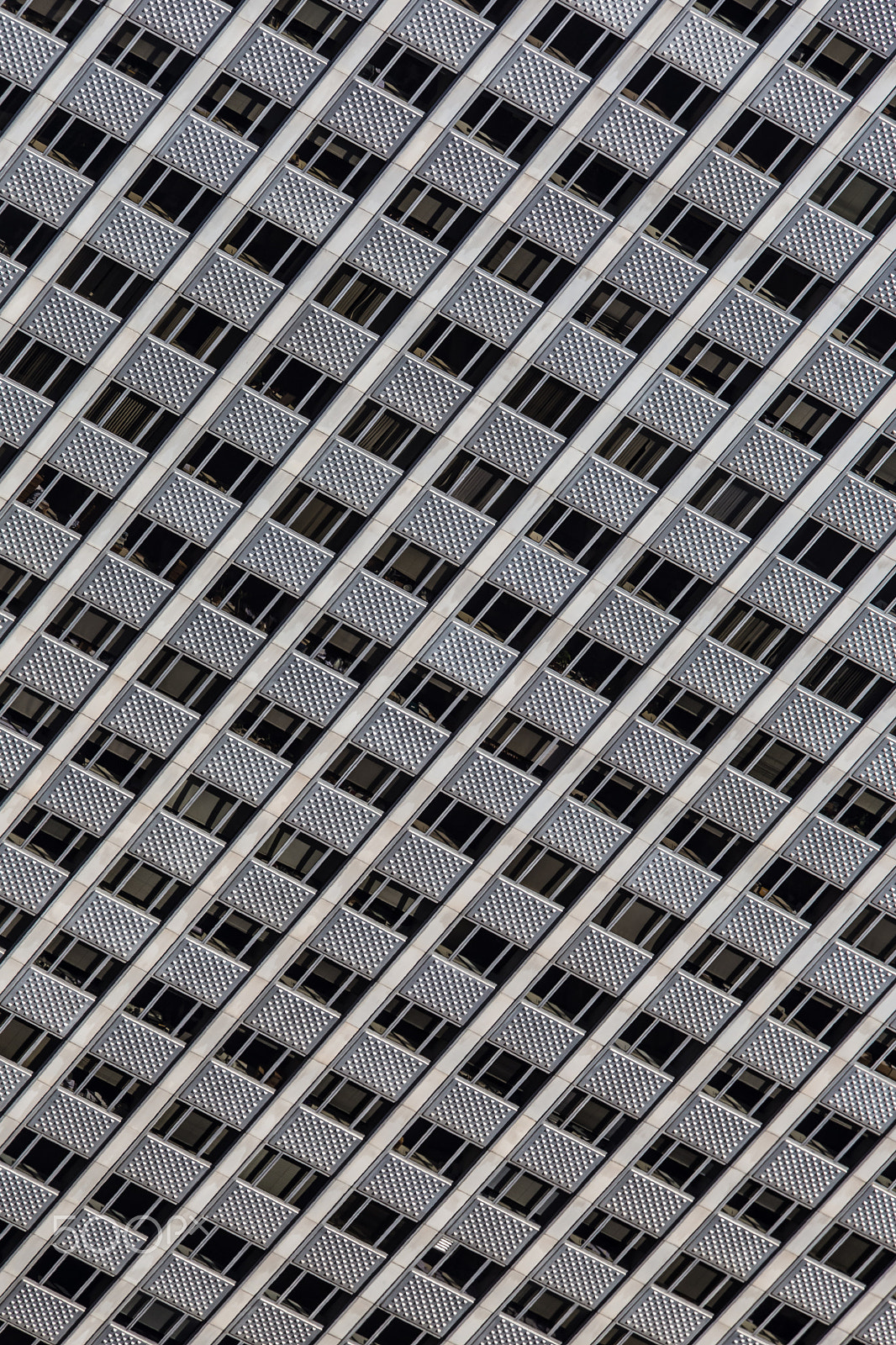 Canon EF 70-200mm F4L IS USM sample photo. Windows of a modern office building. photography