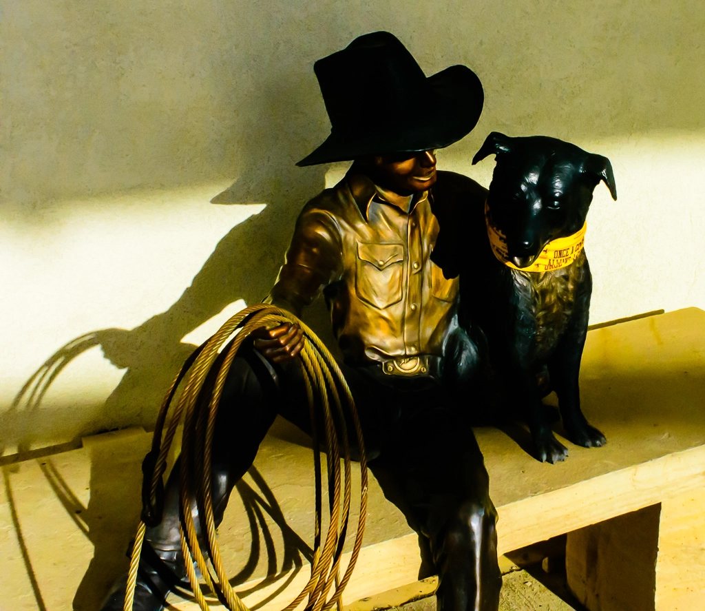 Nikon D7200 sample photo. Bronze cowboy and his dog photography