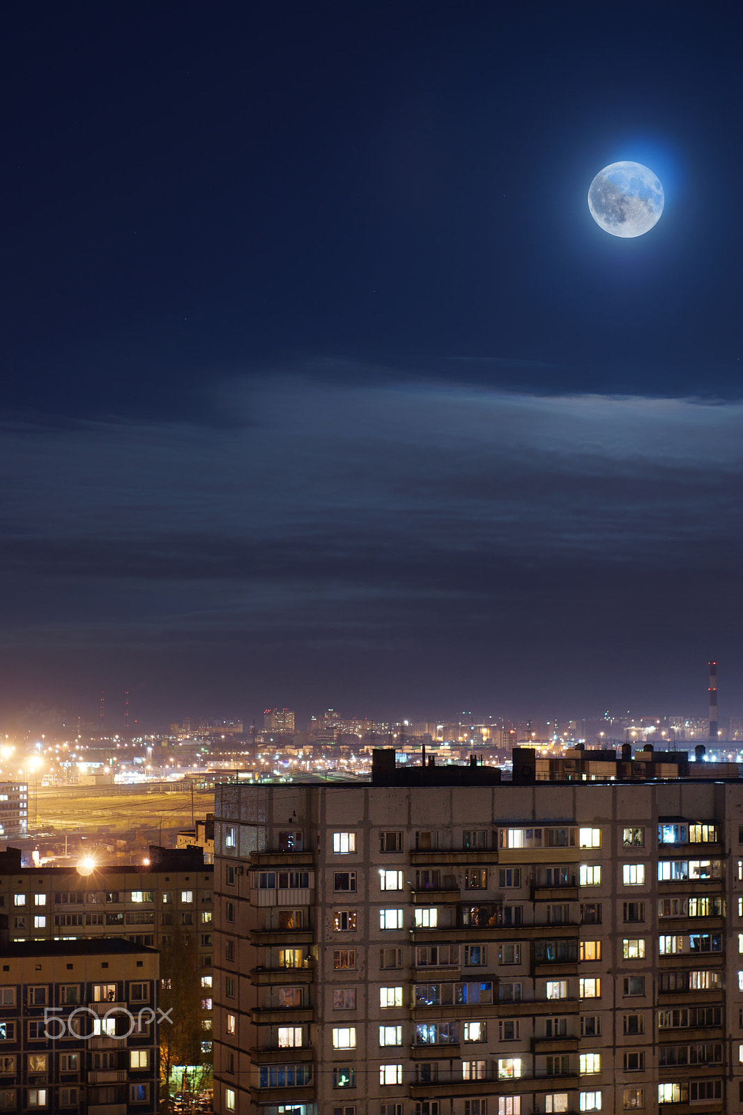 Sony SLT-A65 (SLT-A65V) sample photo. The moon in the night sky over the city block photography