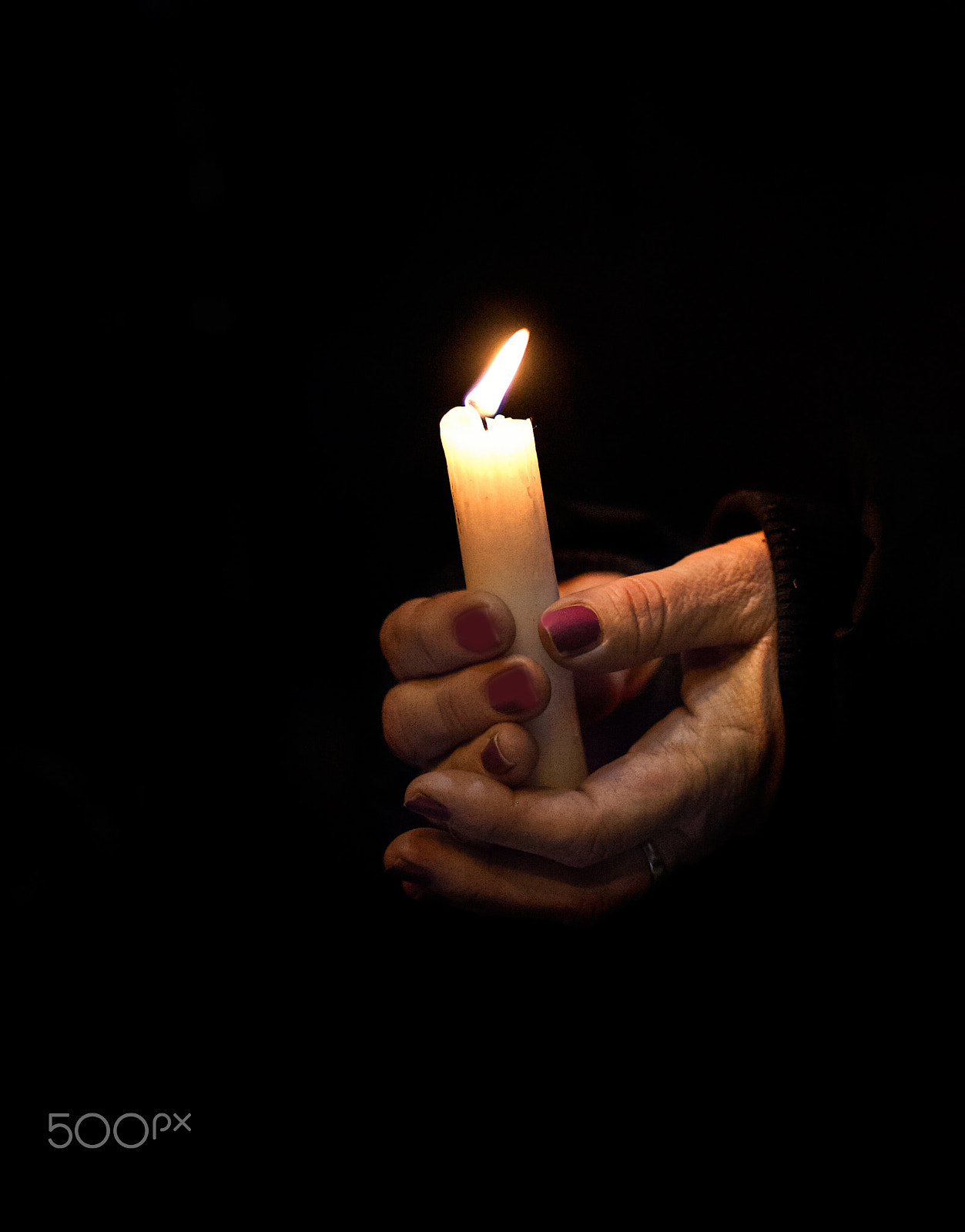 Canon EF 135mm F2L USM sample photo. Candle and hand photography