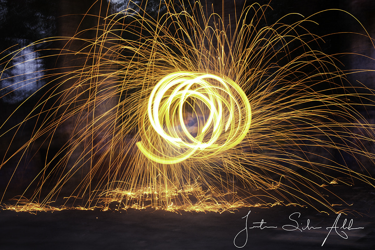 Canon EF-S 17-55mm F2.8 IS USM sample photo. Fiery trails photography