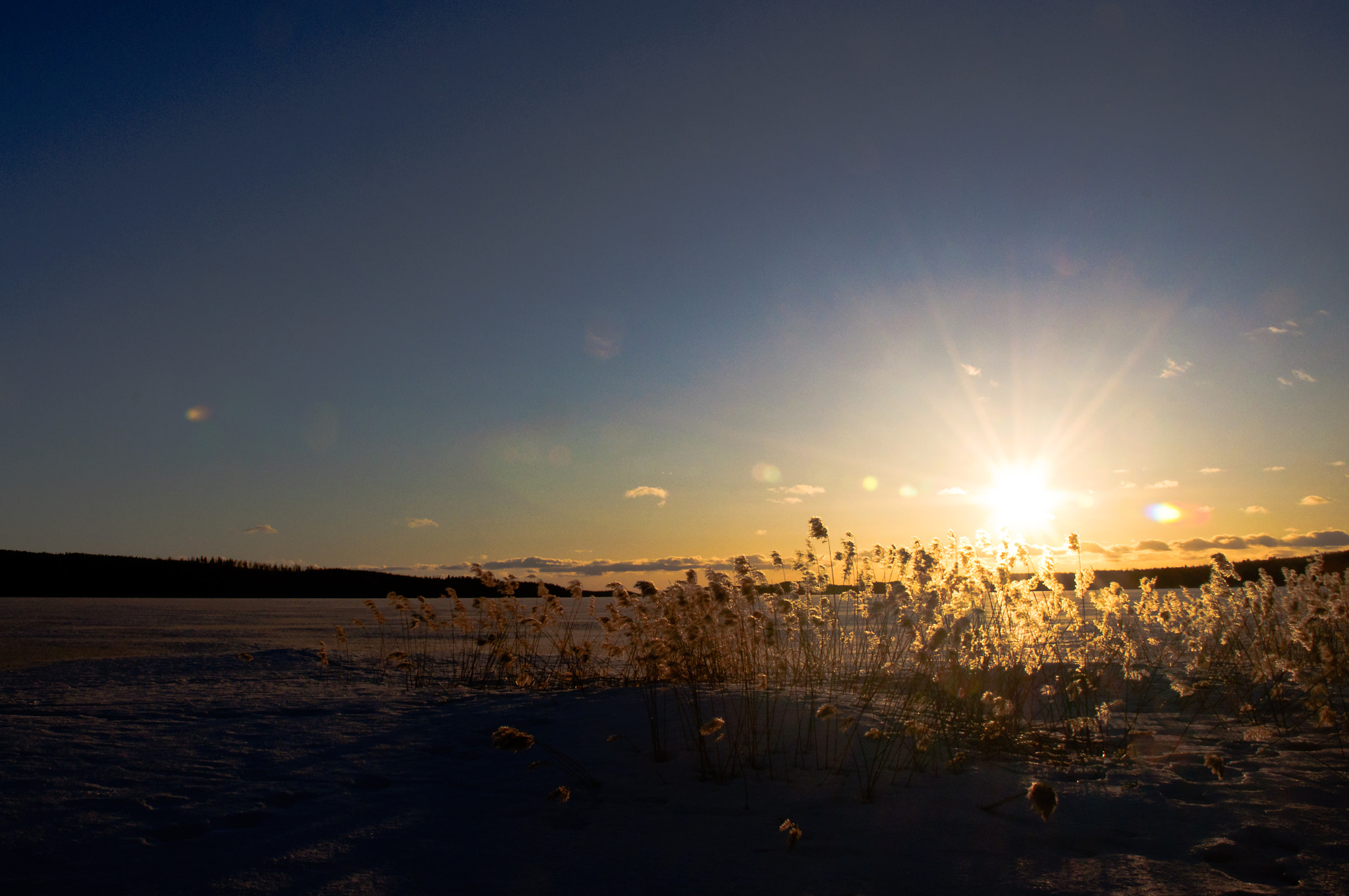 Nikon D90 + Nikon AF-S DX Nikkor 18-70mm F3.5-4.5G ED-IF sample photo. Sunset over frozen lake photography