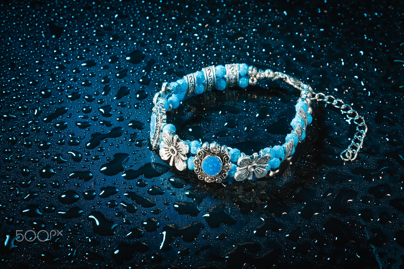 Canon EOS 5D + Sigma 105mm F2.8 EX DG Macro sample photo. Blue bracelet with drops of water photography