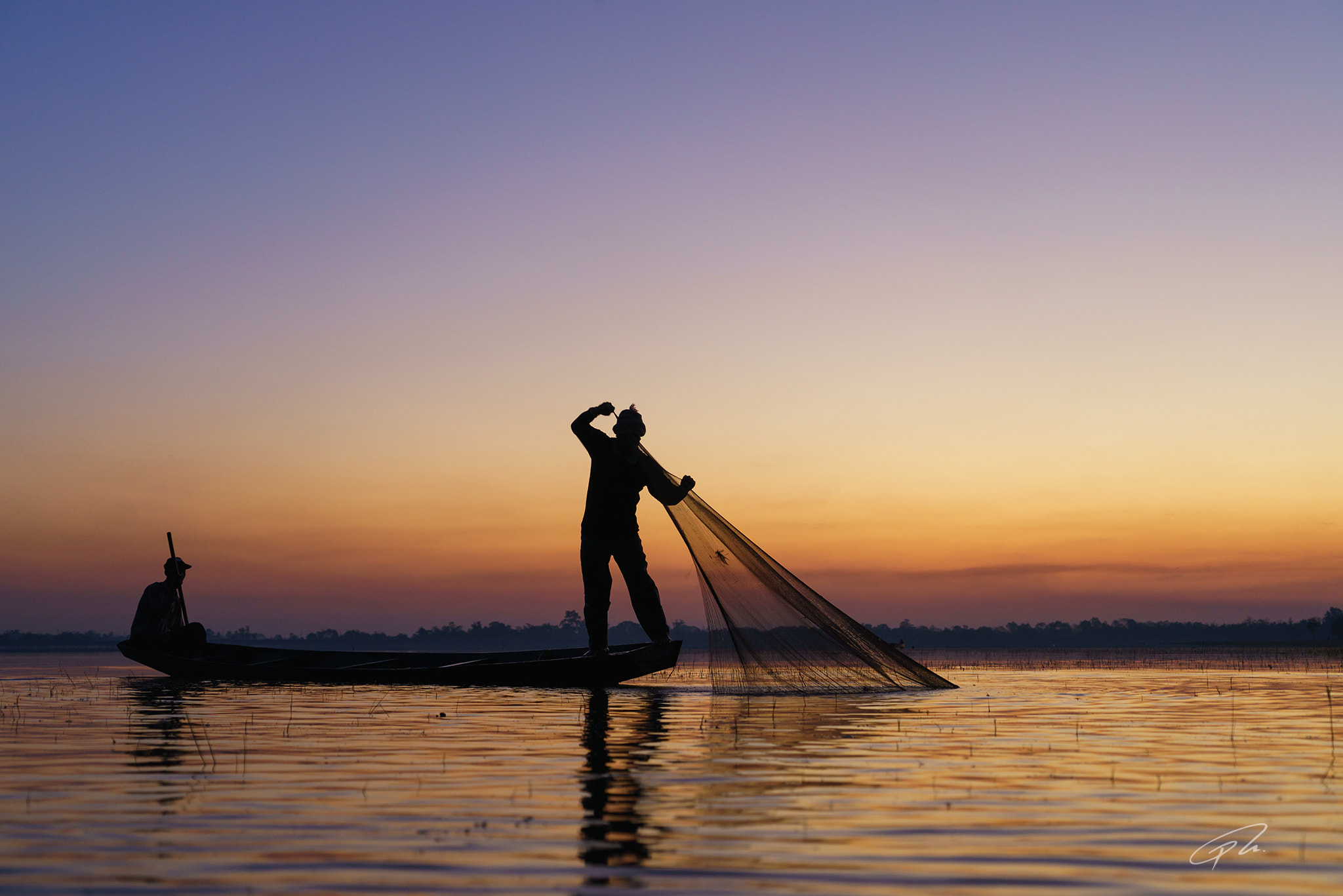 Sony a7R + Sony Vario Tessar T* FE 24-70mm F4 ZA OSS sample photo. Silhouette of traditional fishermen throwing net. photography