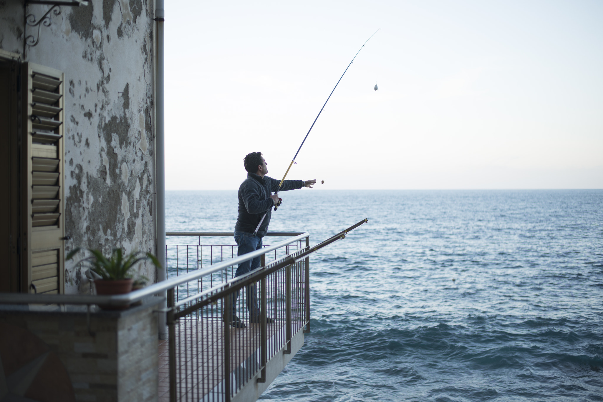 Nikon D800 + Nikon AF-S Nikkor 50mm F1.8G sample photo. Scilla fisherman casting photography