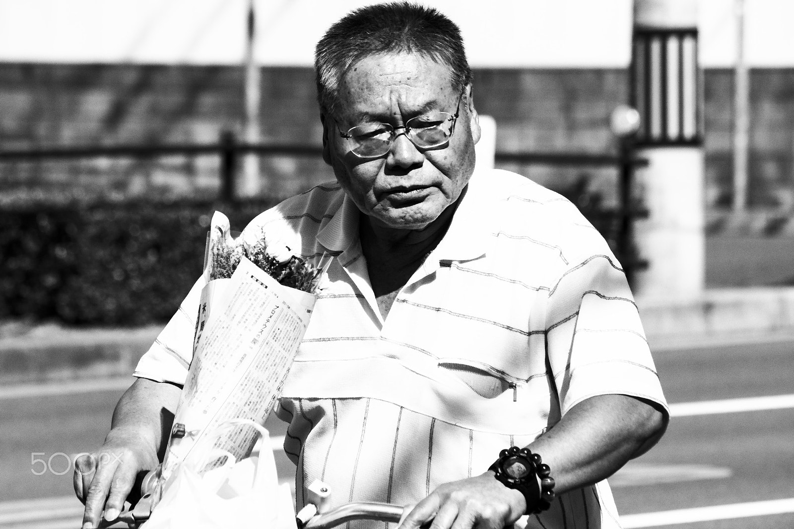 Canon EF-S 55-250mm F4-5.6 IS sample photo. Man with bike photography