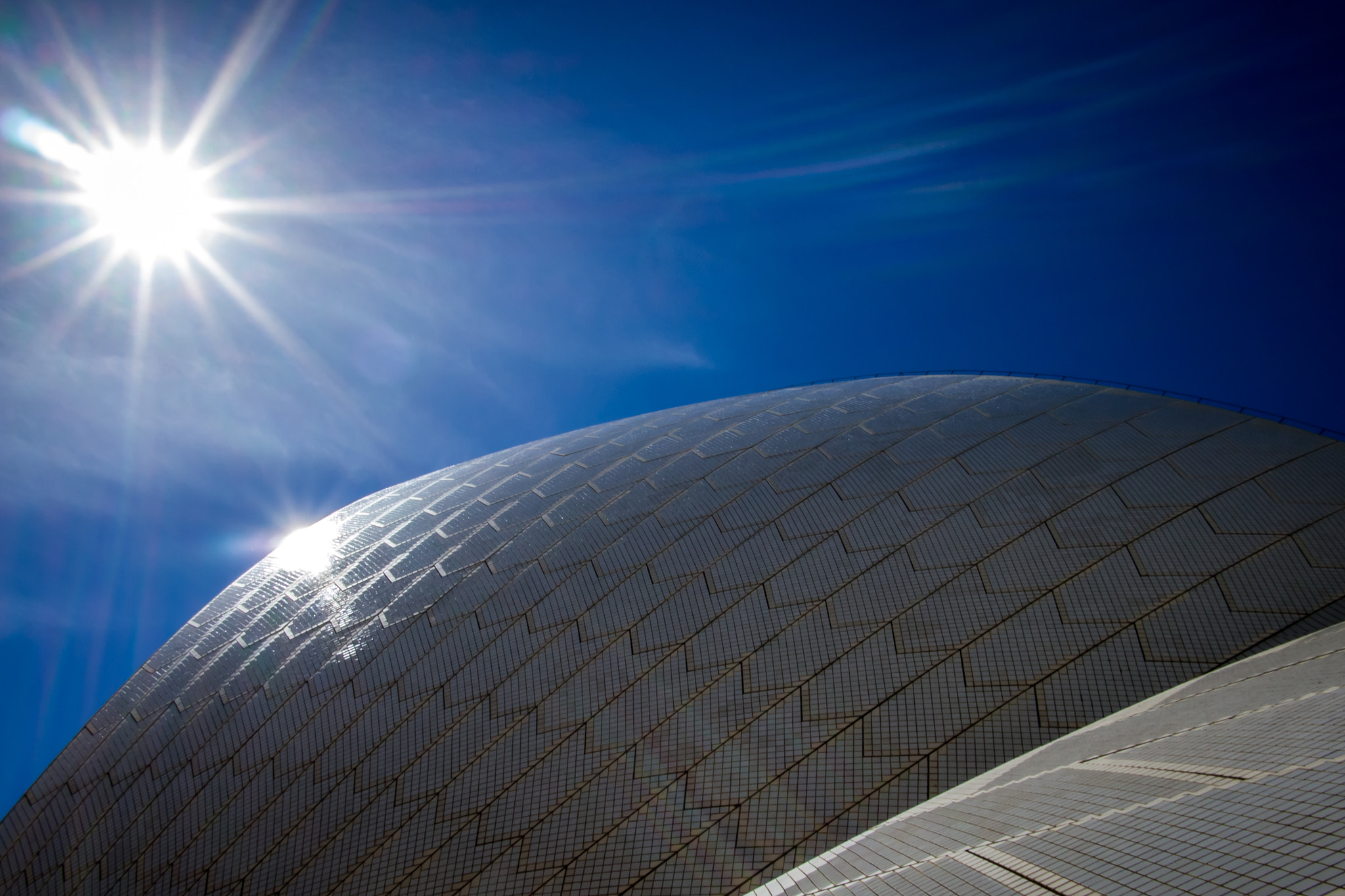 Olympus PEN E-PM1 sample photo. Sydney opera sun rays photography