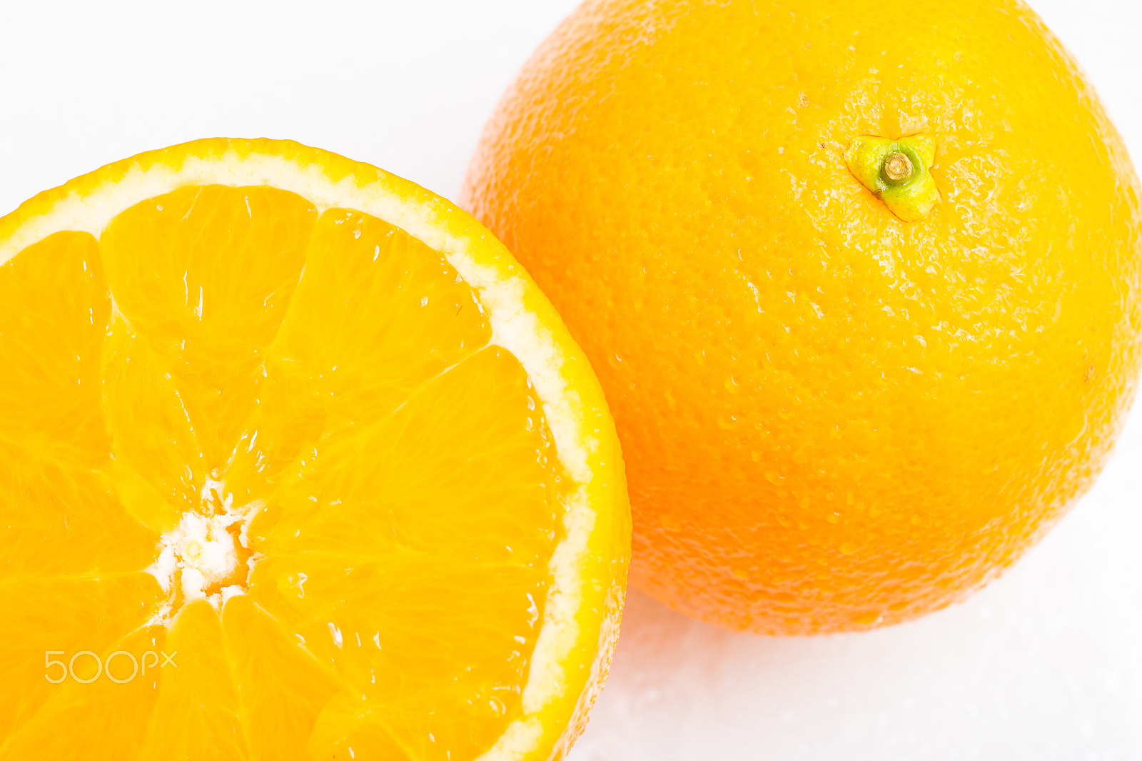 Canon EOS 700D (EOS Rebel T5i / EOS Kiss X7i) + Sigma 50mm f/2.8 EX sample photo. Bahia navel orange fruit photography