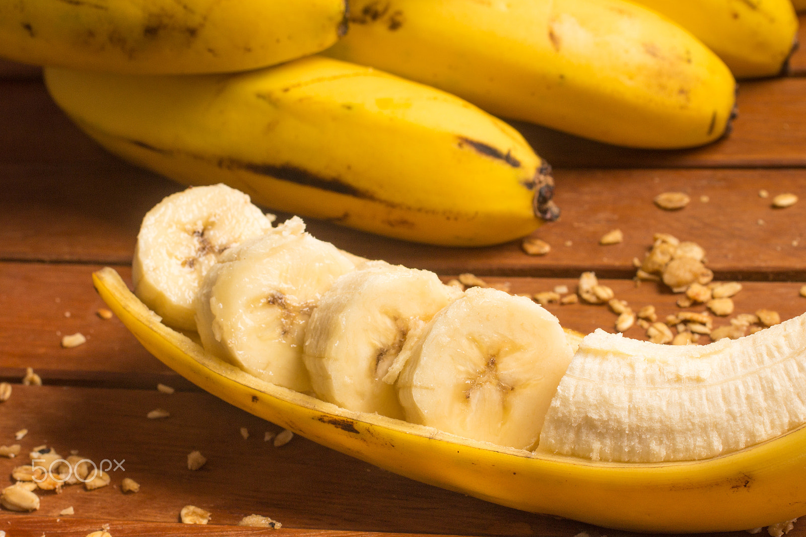 Canon EOS 700D (EOS Rebel T5i / EOS Kiss X7i) + Sigma 50mm f/2.8 EX sample photo. Sliced banana and granola. photography