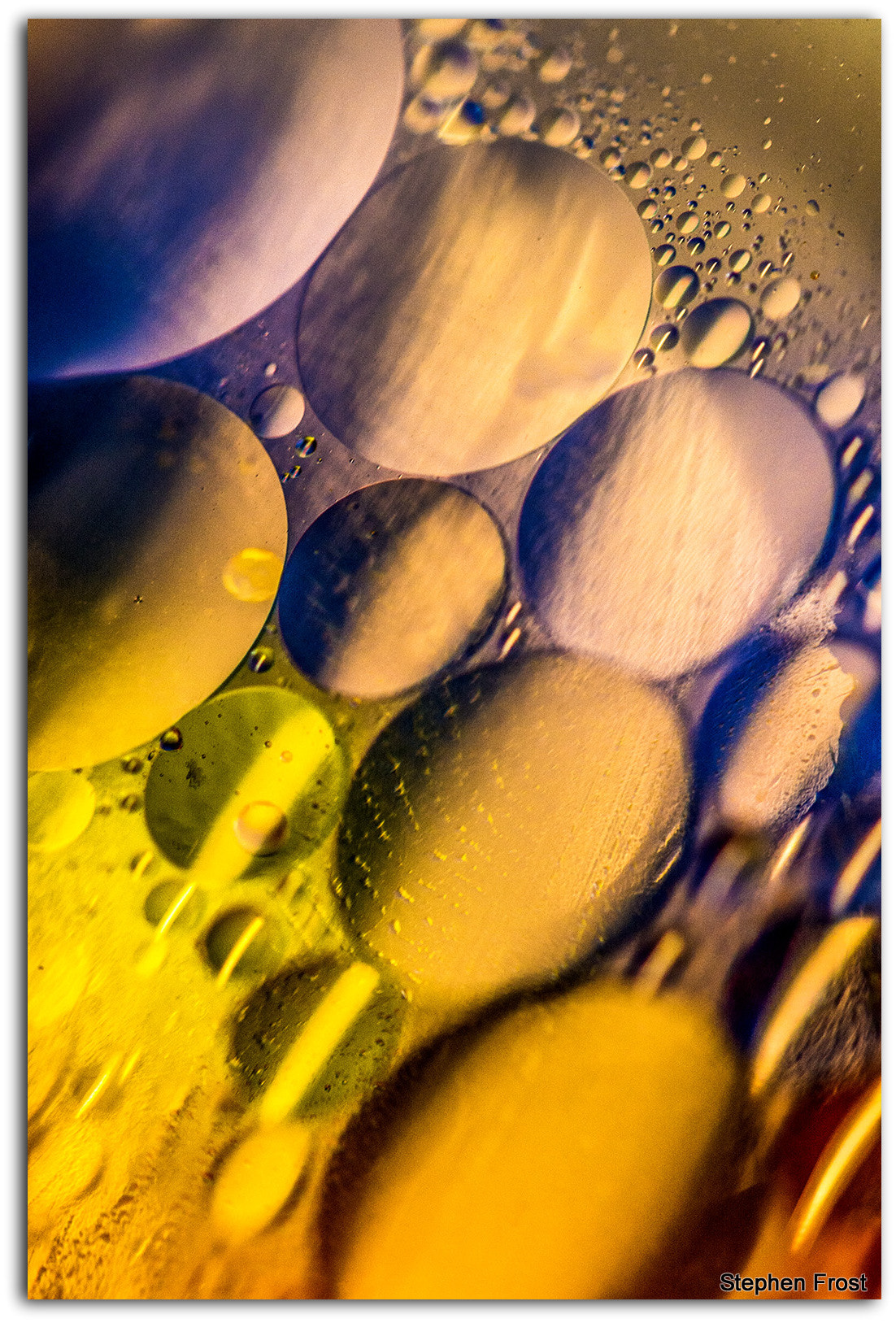 Sigma 105mm F2.8 EX DG OS HSM sample photo. A rainy day project : using oil and water and underneath lighting colours provided by m & m sweets photography