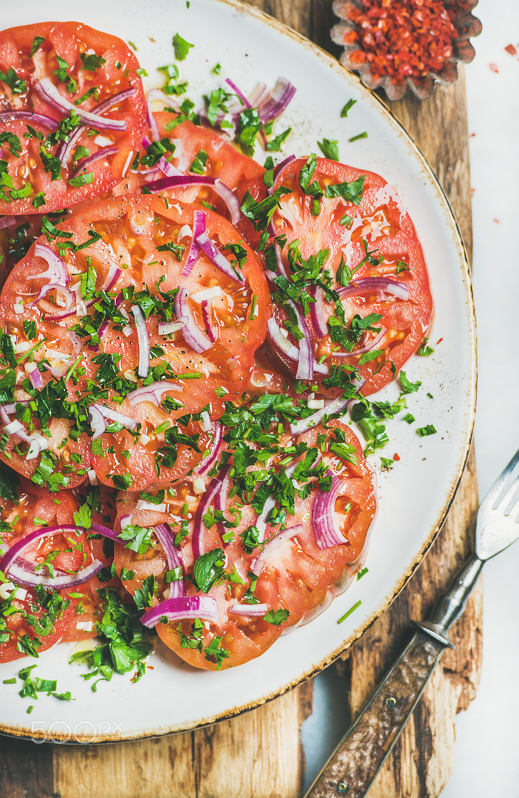 Nikon AF-S Nikkor 70-200mm F2.8G ED VR II sample photo. Fresh heirloom tomato, parsley and onion salad in plate photography