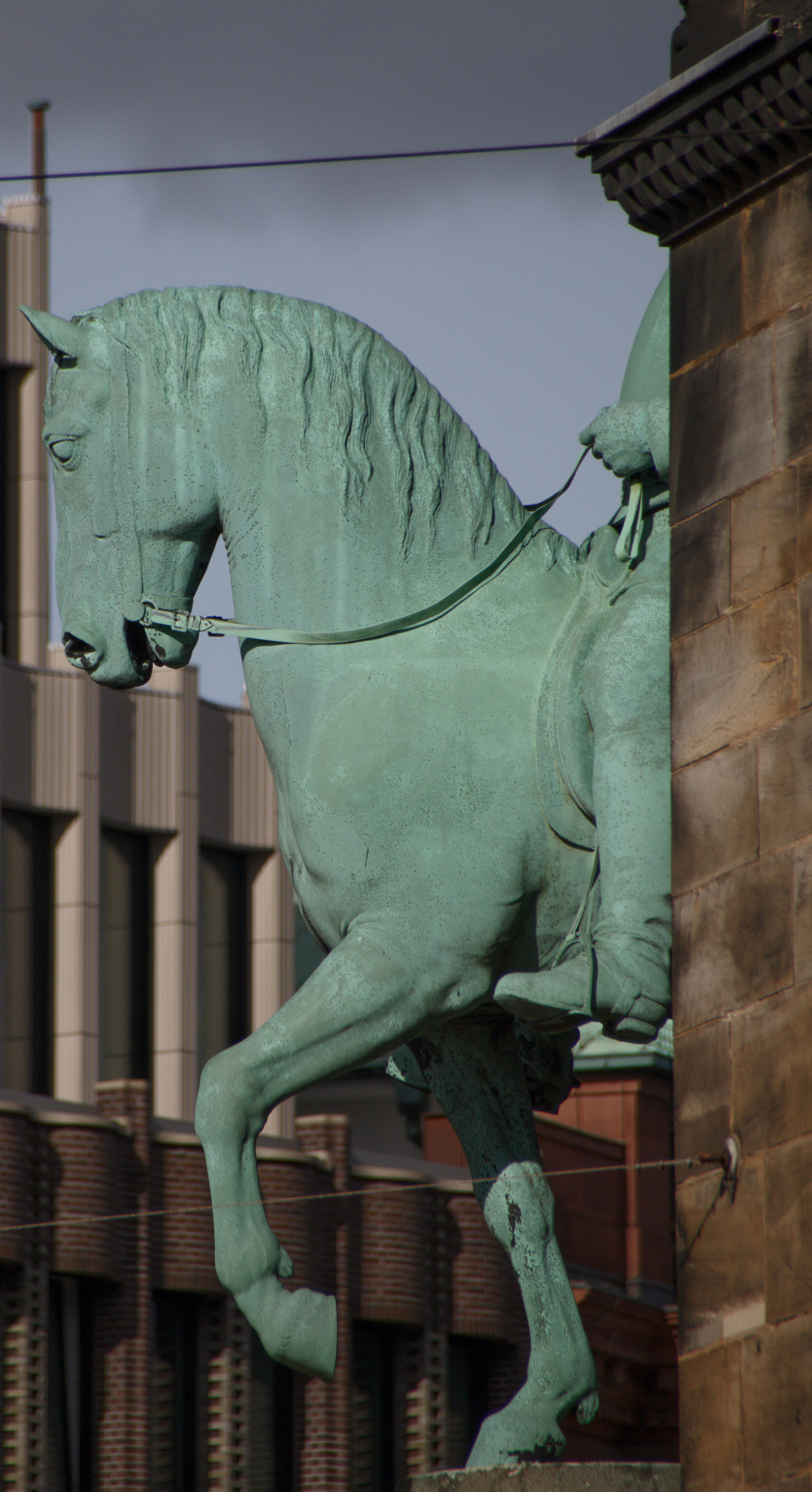 Sigma 18-250mm F3.5-6.3 DC OS HSM sample photo. Bismarck's horse trotting 'round the corner photography