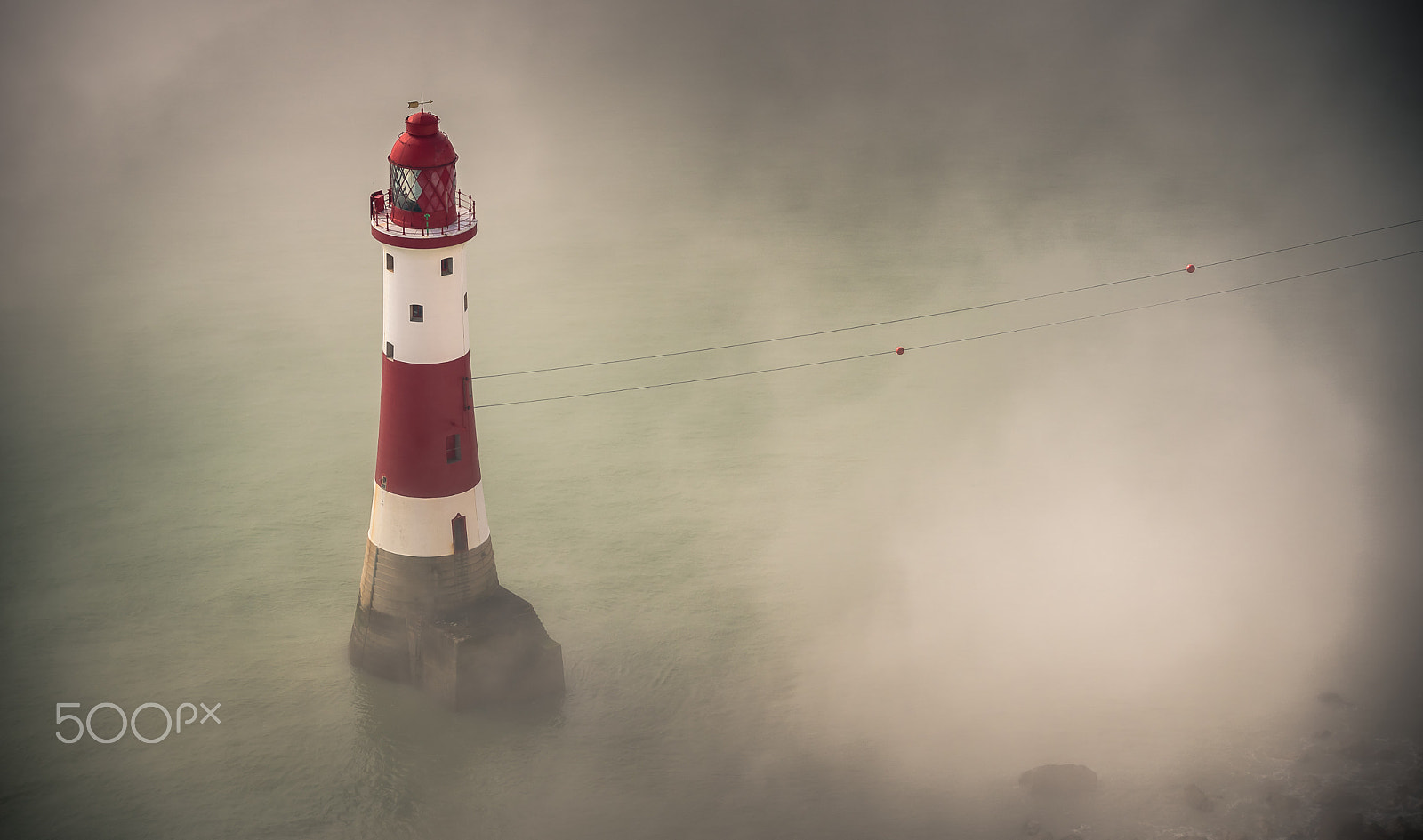 Nikon D750 sample photo. Lighthouse surrounded by fog photography