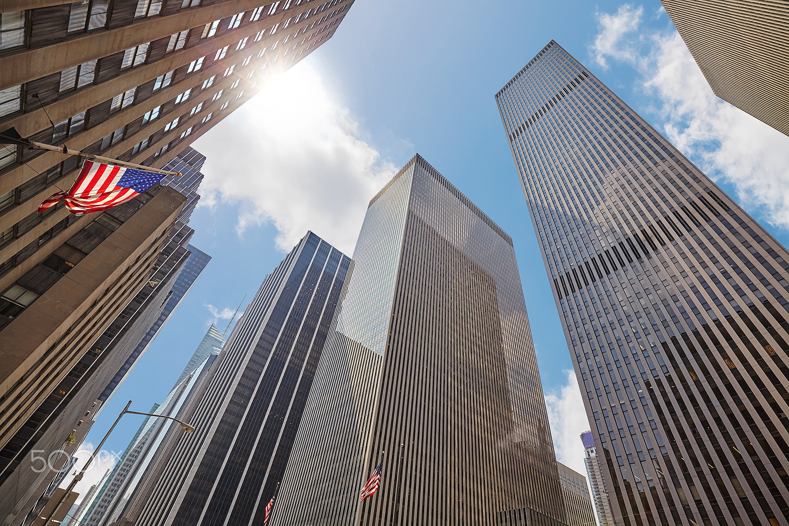 Canon EF 16-35mm F4L IS USM sample photo. Sun in the city photography