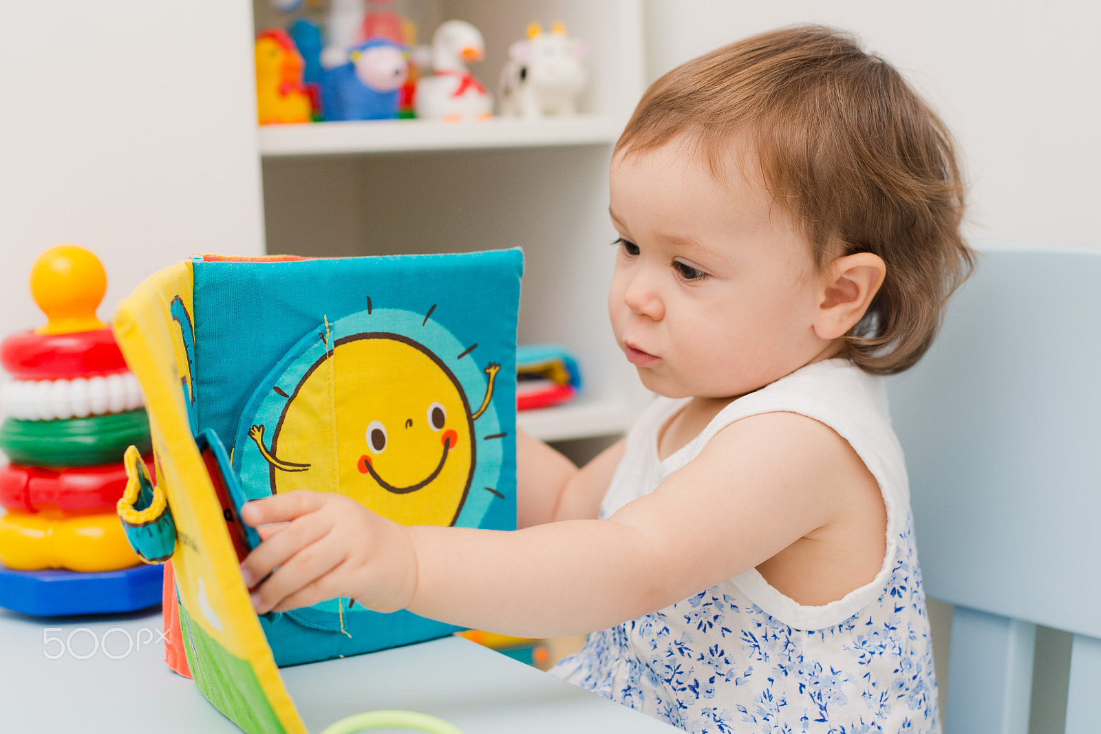 Nikon D800 sample photo. Baby girl playing with educational toy in nursery photography