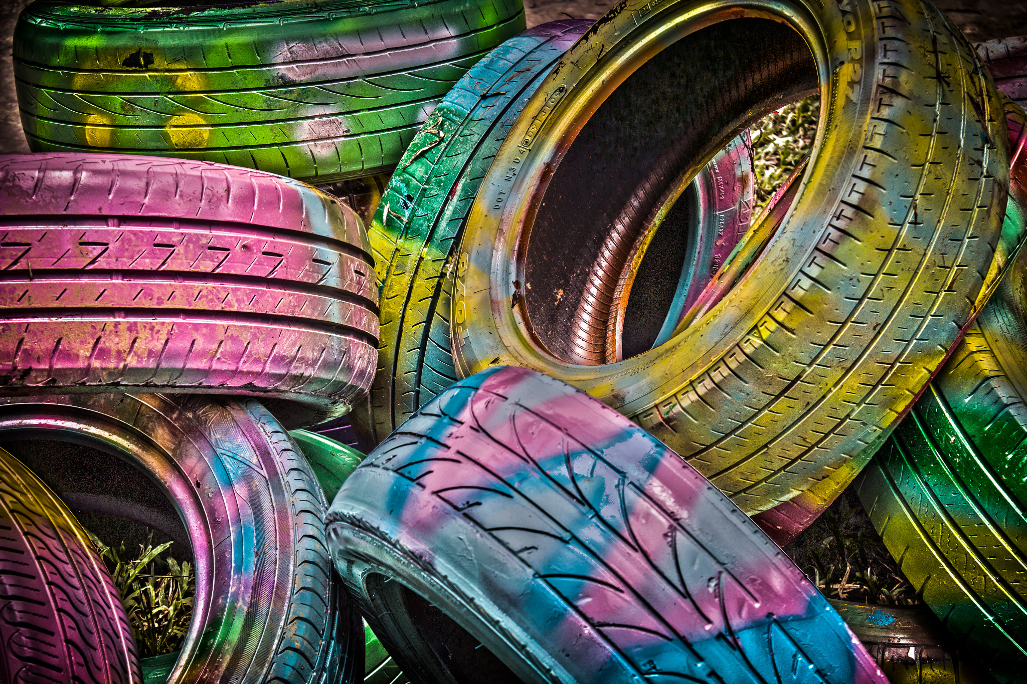 Canon EOS 70D sample photo. Flourescent spray painted old tires photography