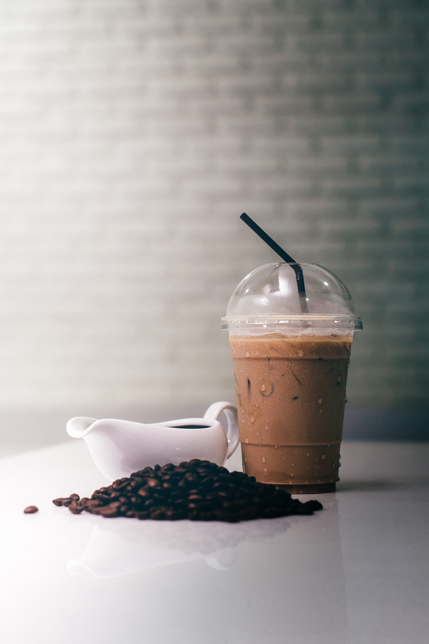 Canon EOS 60D + Canon EF 50mm F1.4 USM sample photo. Ice coffee  with coffee beans and jar on modern kitchen table. photography