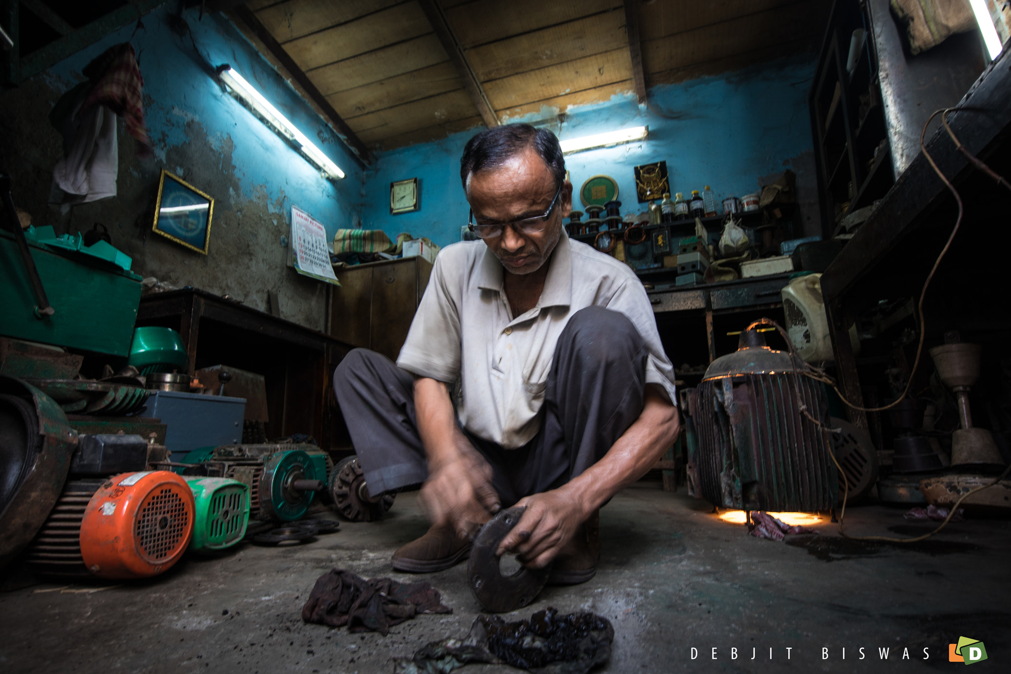 Canon EF-M 11-22mm F4-5.6 IS STM sample photo. The mechanic's shop photography